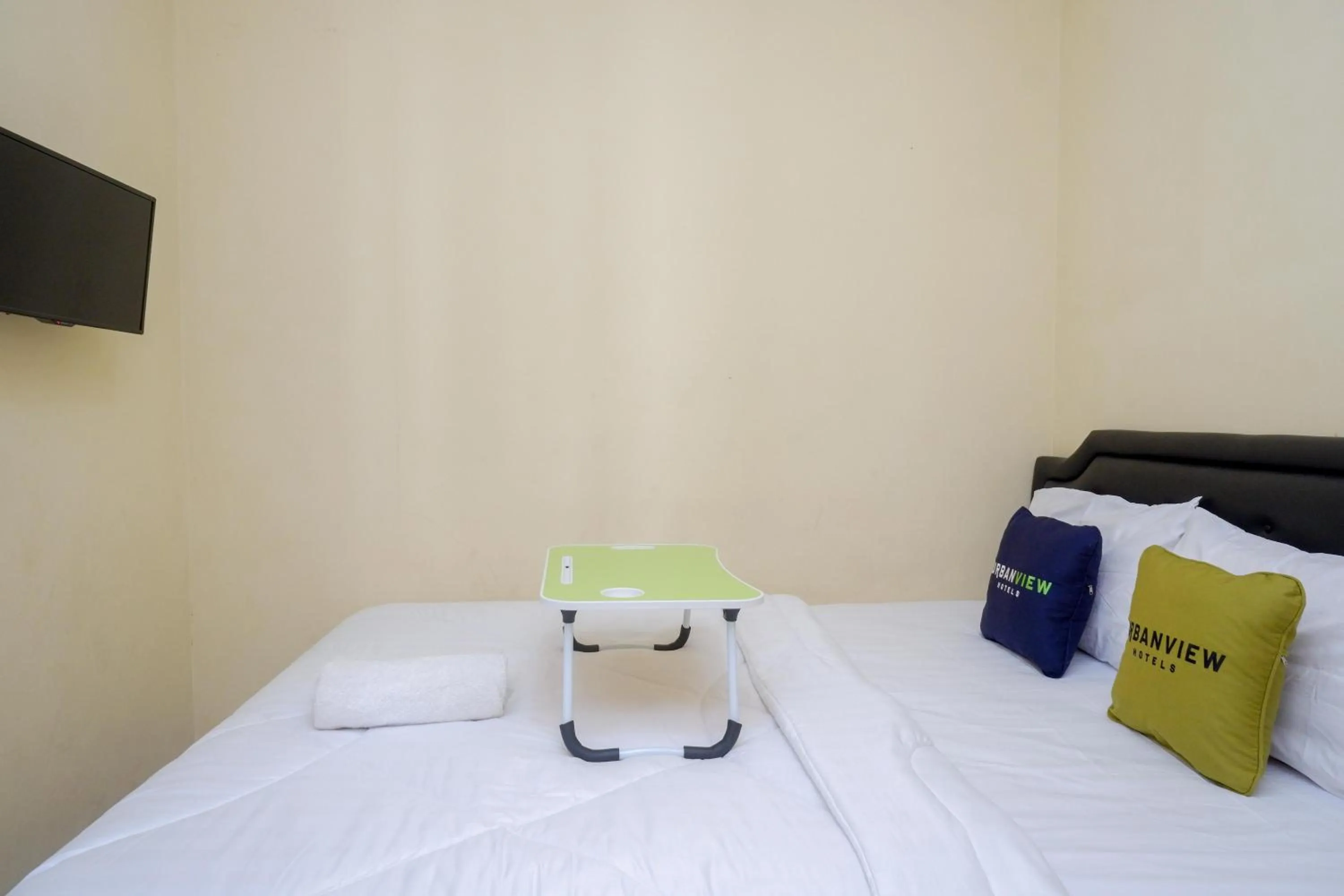 Bedroom, Bed in Urbanview Hotel Jogja City Mall