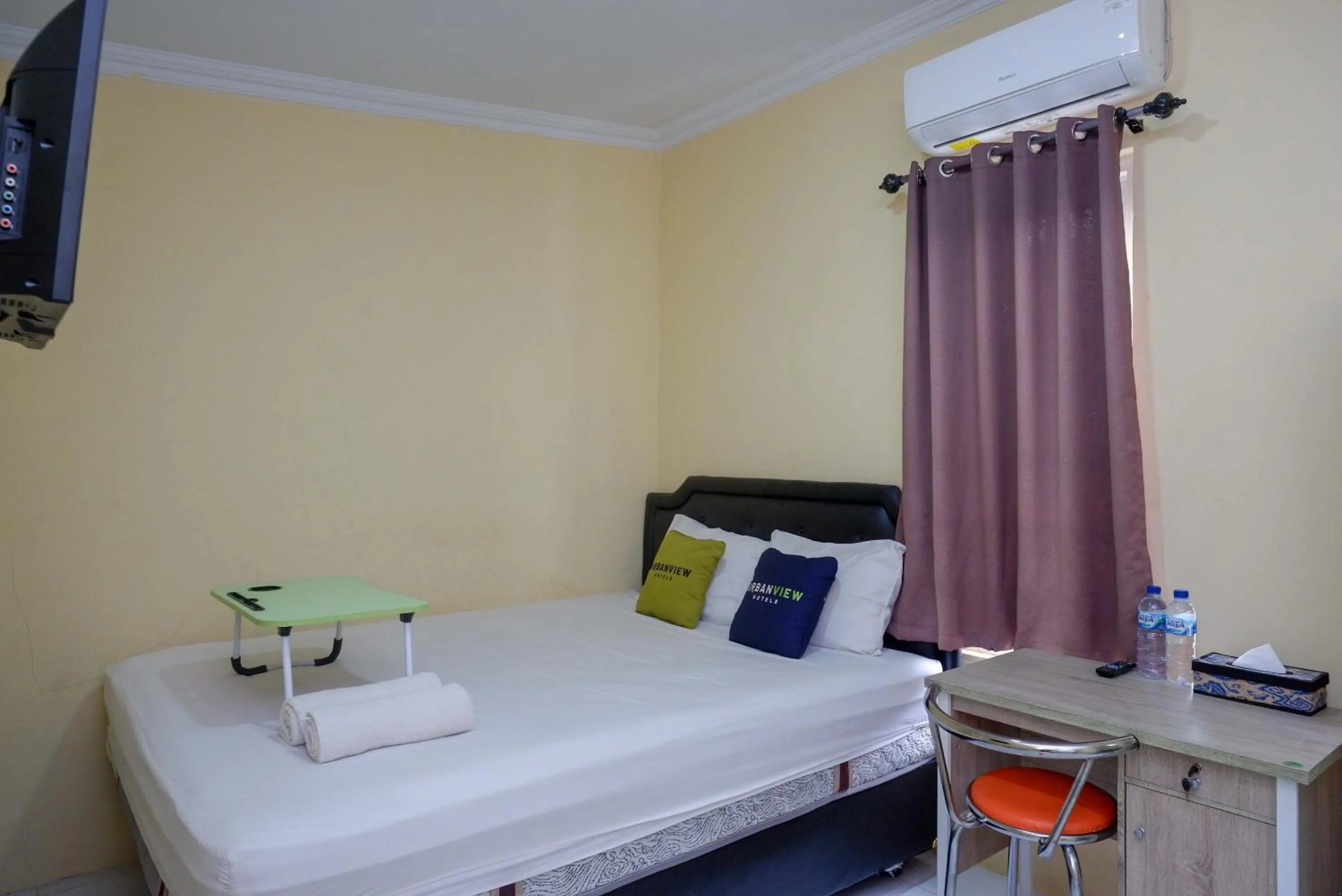 Bedroom, Bed in Urbanview Hotel Jogja City Mall