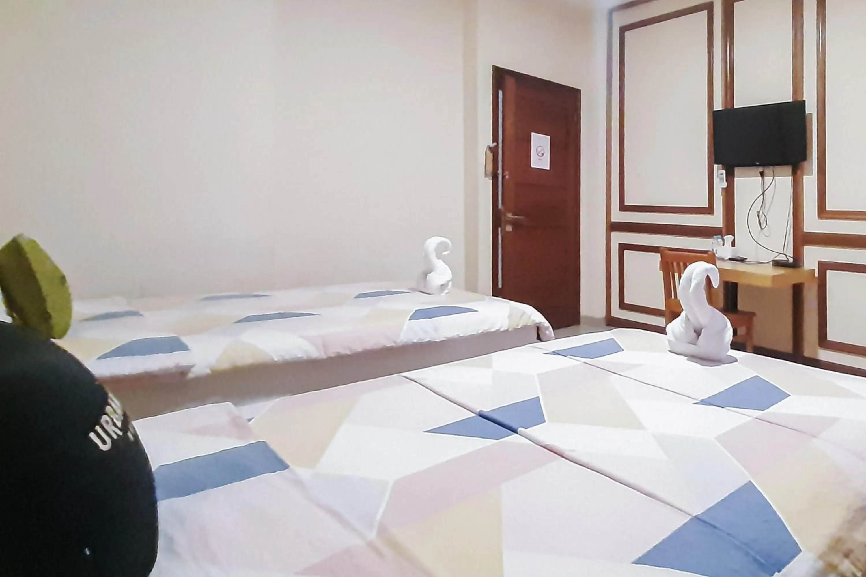 Bedroom, Bed in Urbanview Remington Hotel By RedDoorz Palembang