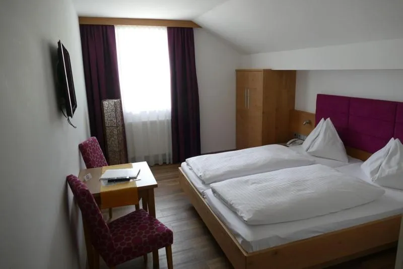 Bed in Hotel Gasthof Mitteregger - BEST PLACE in town with summercard included