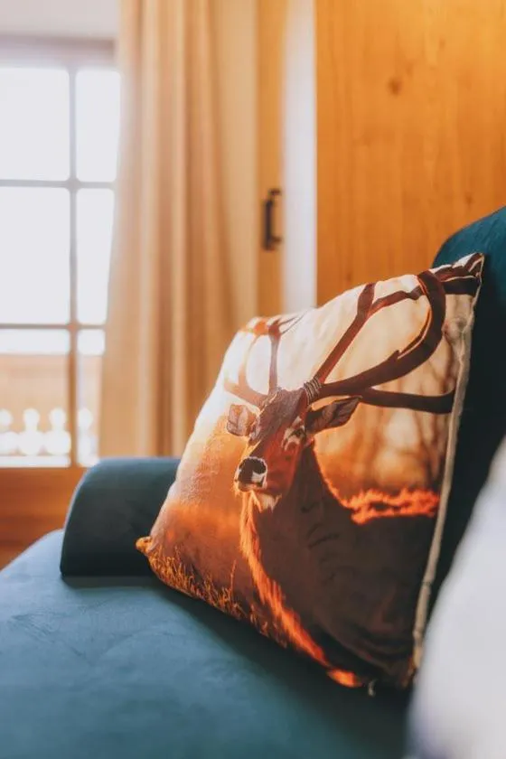 Seating area, Bed in Hotel Gasthof Mitteregger - BEST PLACE in town with summercard included