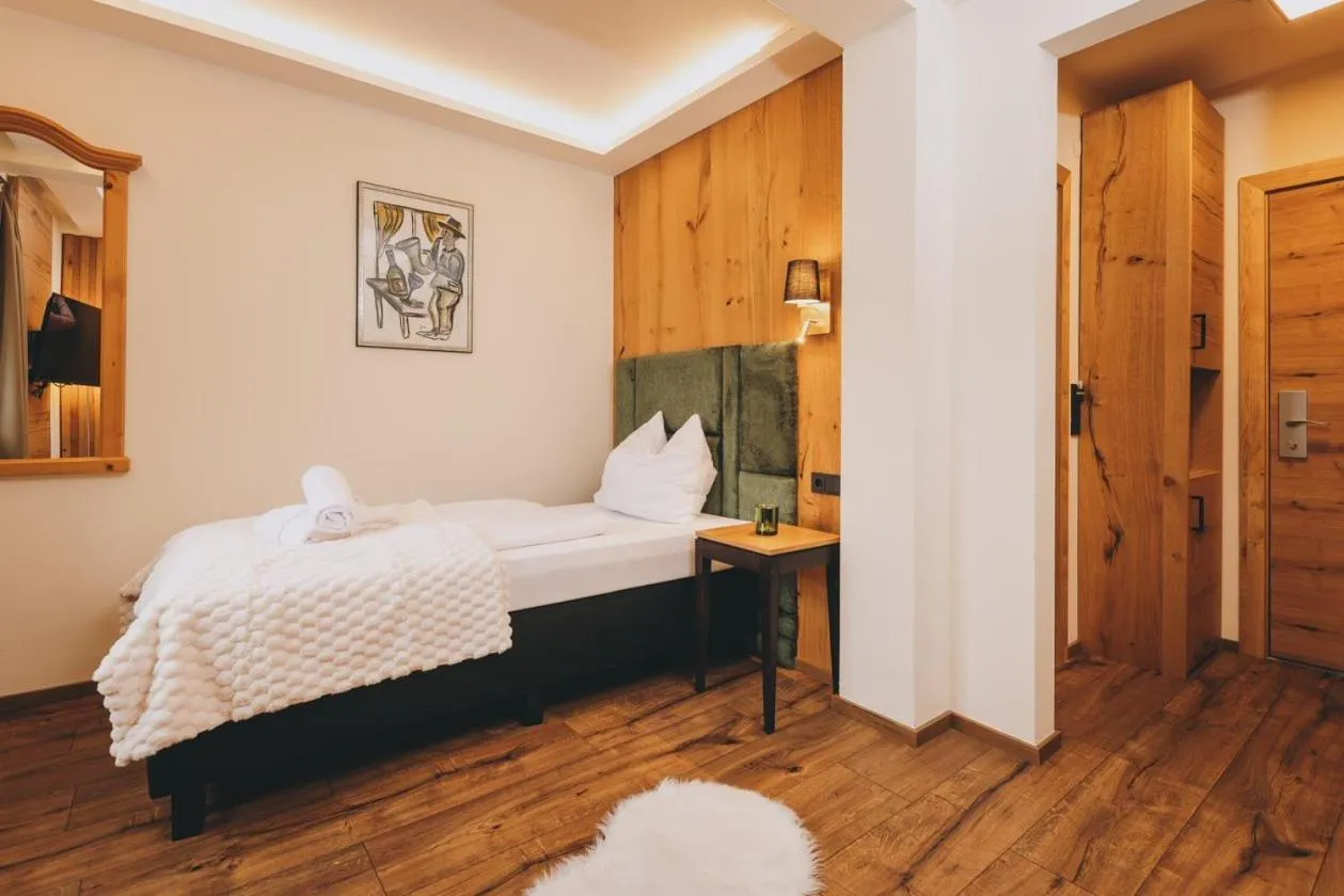 Photo of the whole room, Bed in Hotel Gasthof Mitteregger - BEST PLACE in town with summercard included