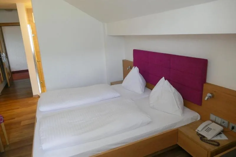 Bed in Hotel Gasthof Mitteregger - BEST PLACE in town with summercard included