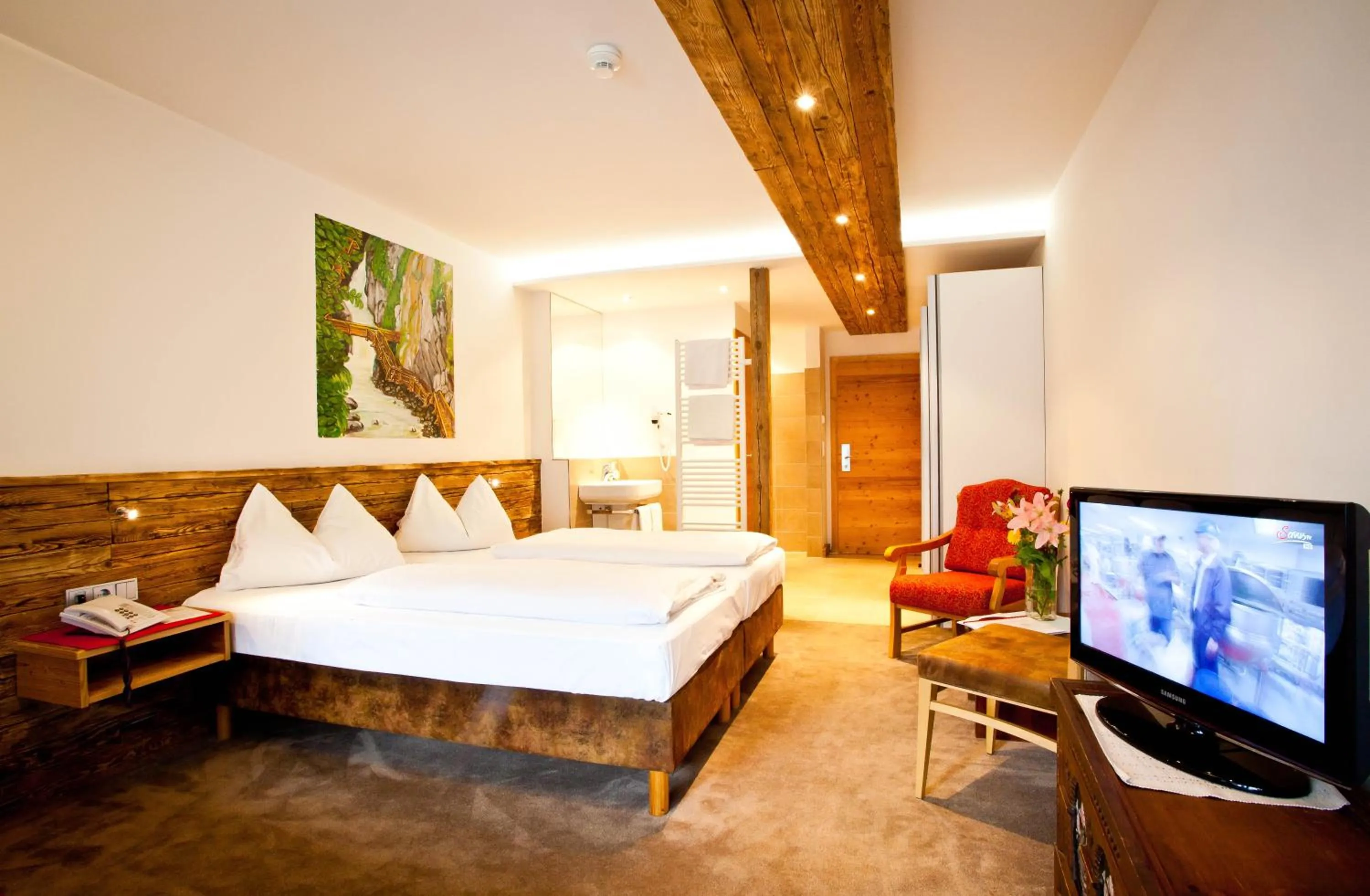 Bed in Hotel Gasthof Mitteregger - BEST PLACE in town with summercard included