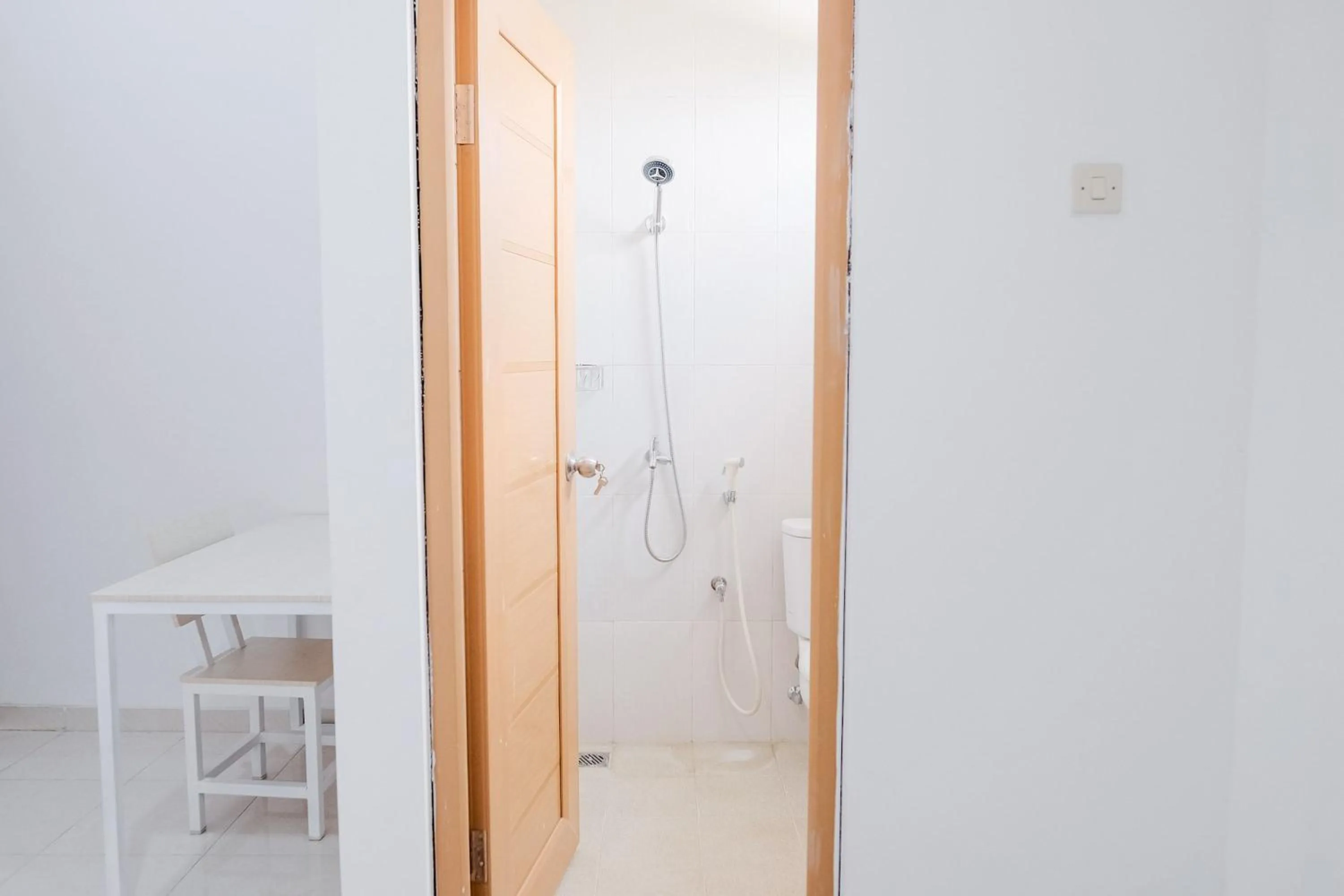 Bathroom in KoolKost near Jalan Veteran Raya (Minimum Stay 6 Nights)