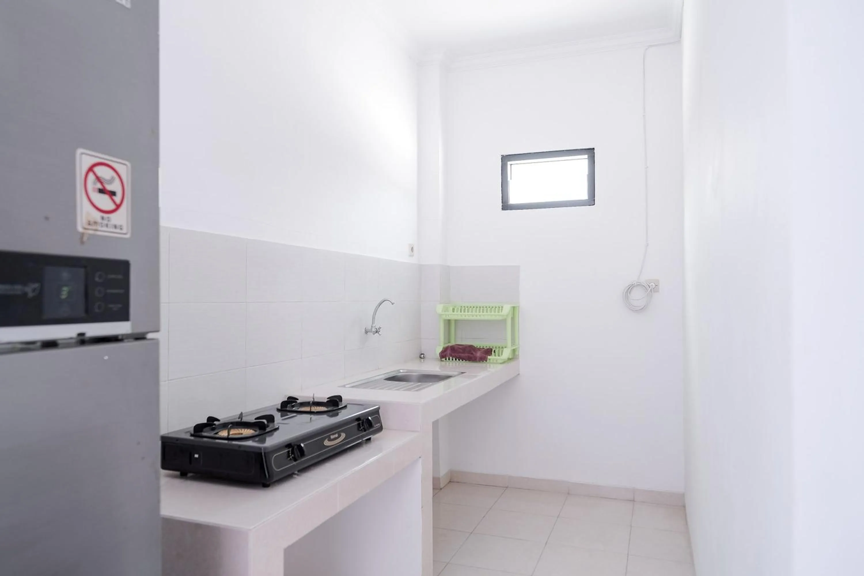 Kitchen or kitchenette in KoolKost near Jalan Veteran Raya (Minimum Stay 6 Nights)