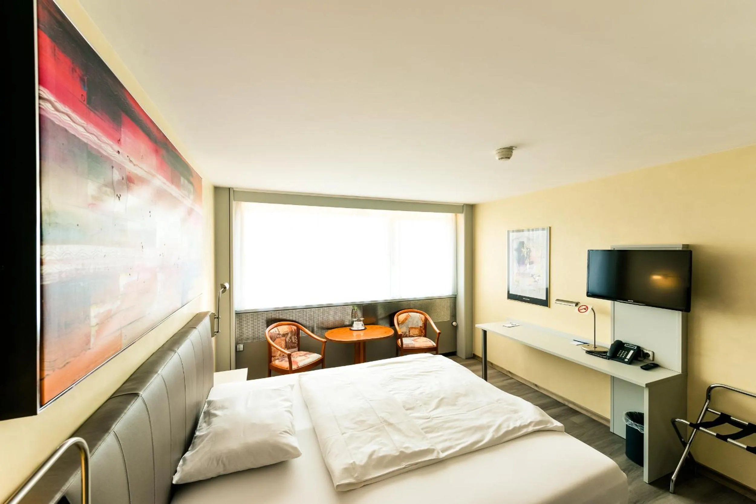 Photo of the whole room, Bed in City Hotel Heilbronn