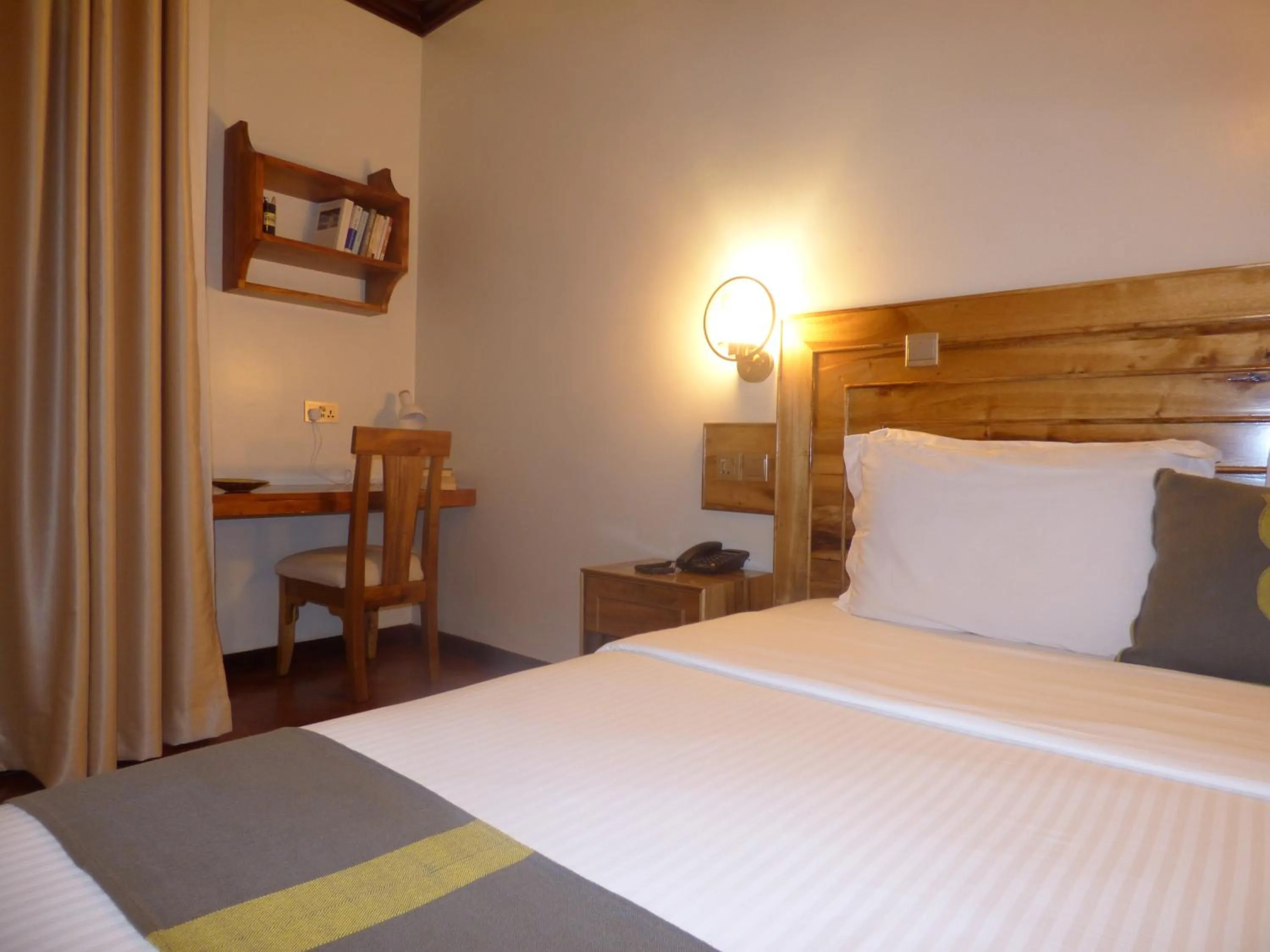 Bed in Le Pristine Wellness and Healing Hotel