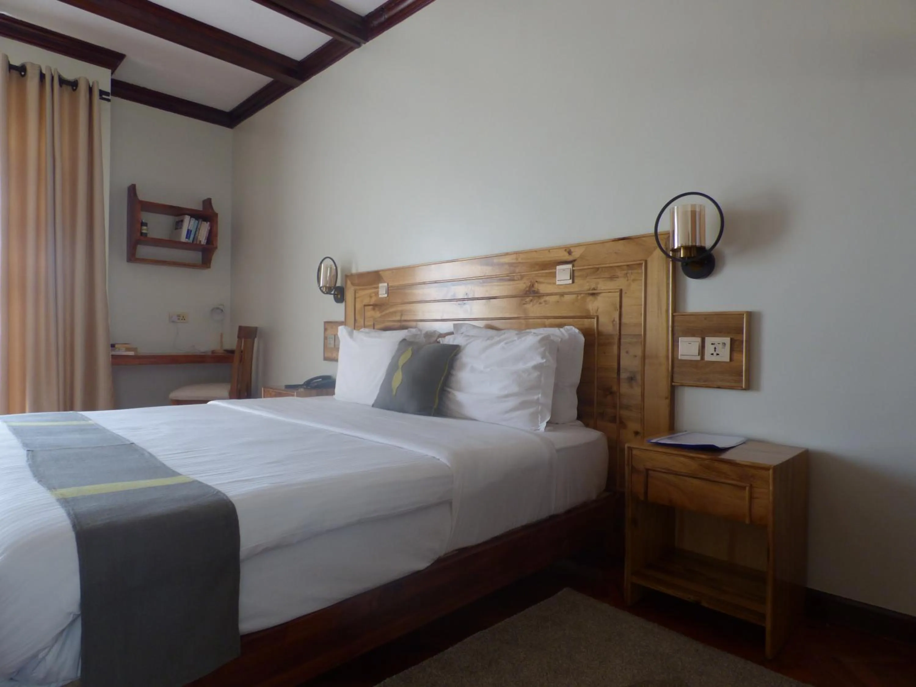 Bed in Le Pristine Wellness and Healing Hotel