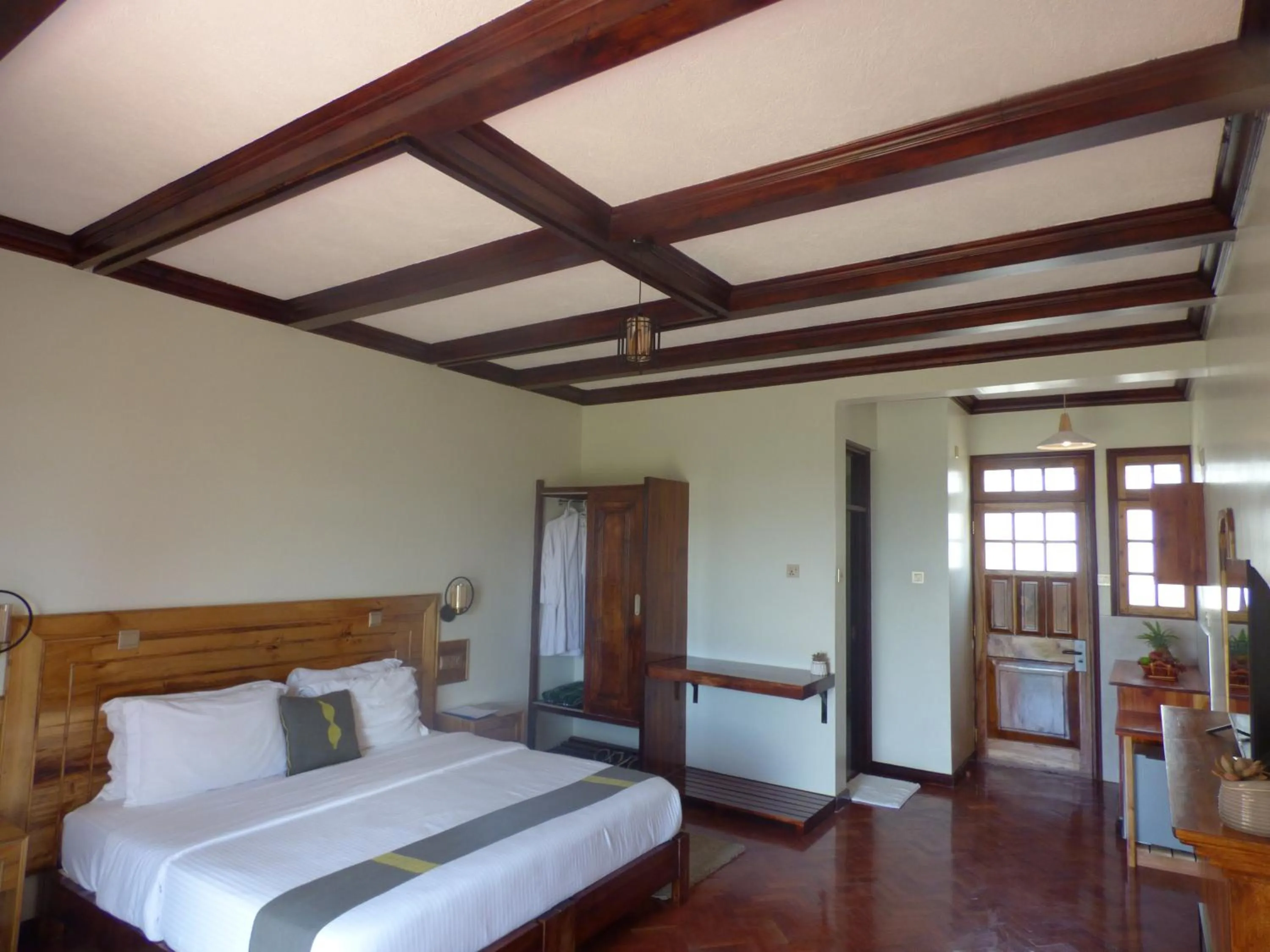 Bed in Le Pristine Wellness and Healing Hotel