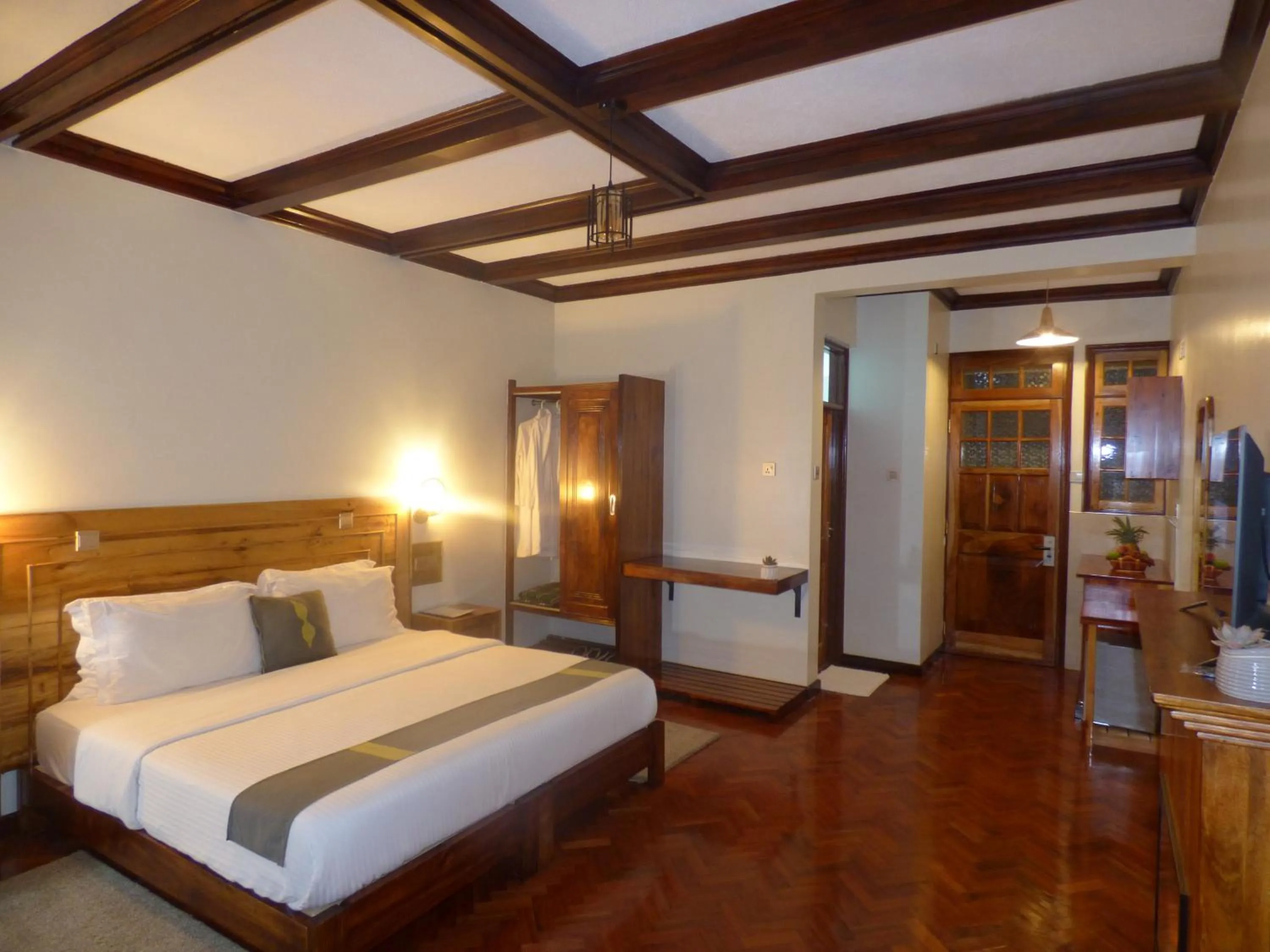 Bed in Le Pristine Wellness and Healing Hotel