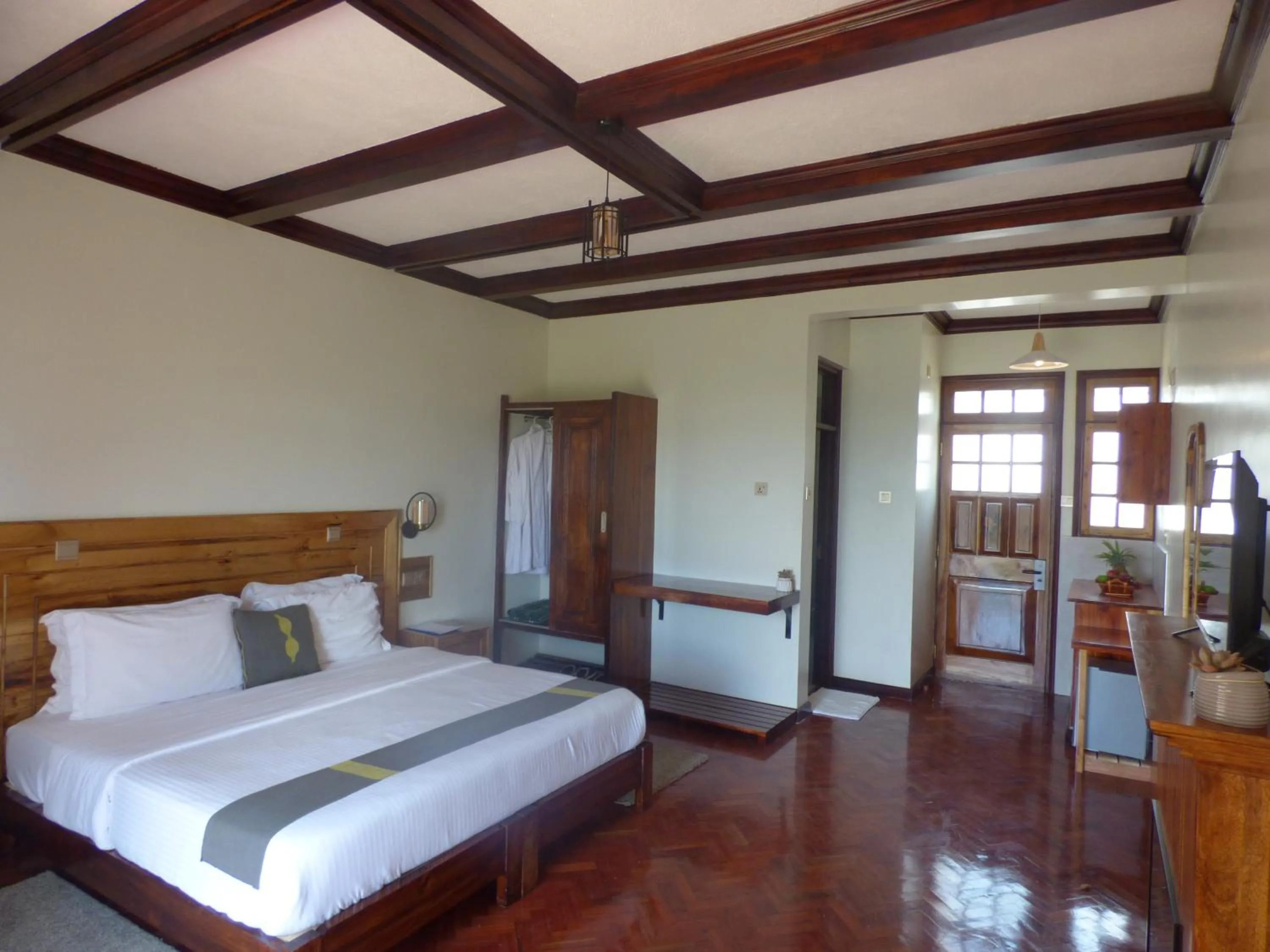 Bed in Le Pristine Wellness and Healing Hotel