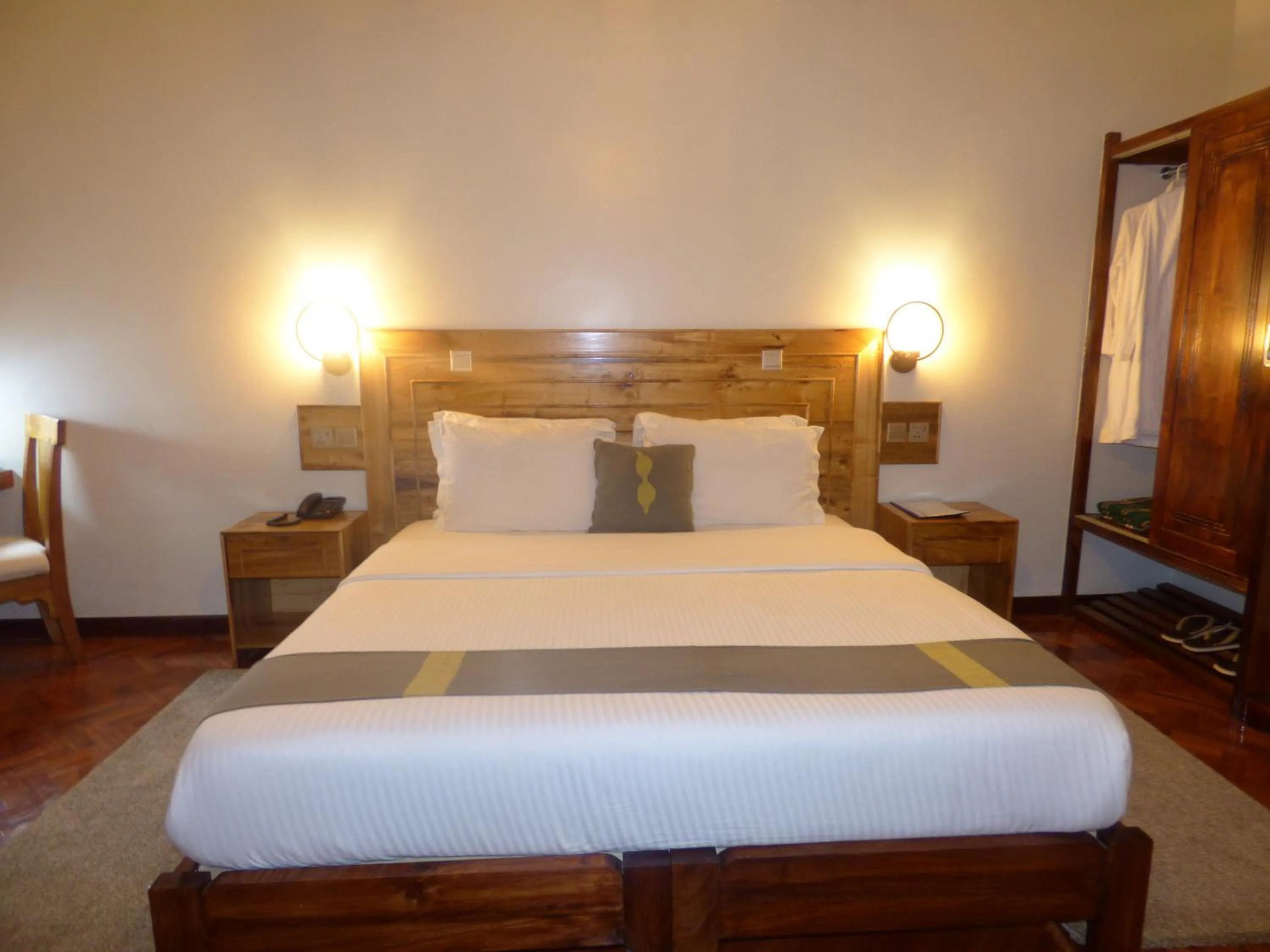 Bed in Le Pristine Wellness and Healing Hotel