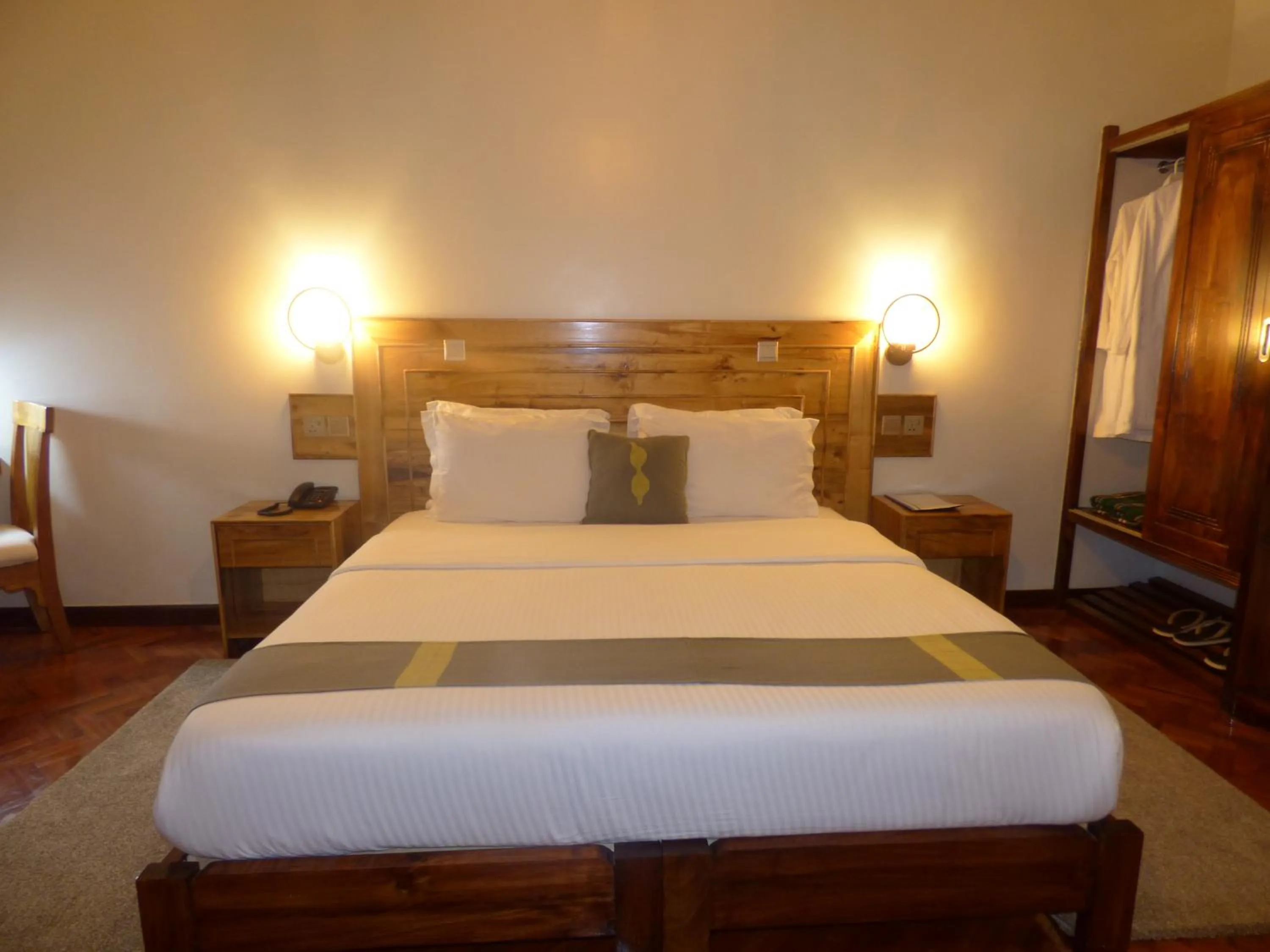 Bed in Le Pristine Wellness and Healing Hotel