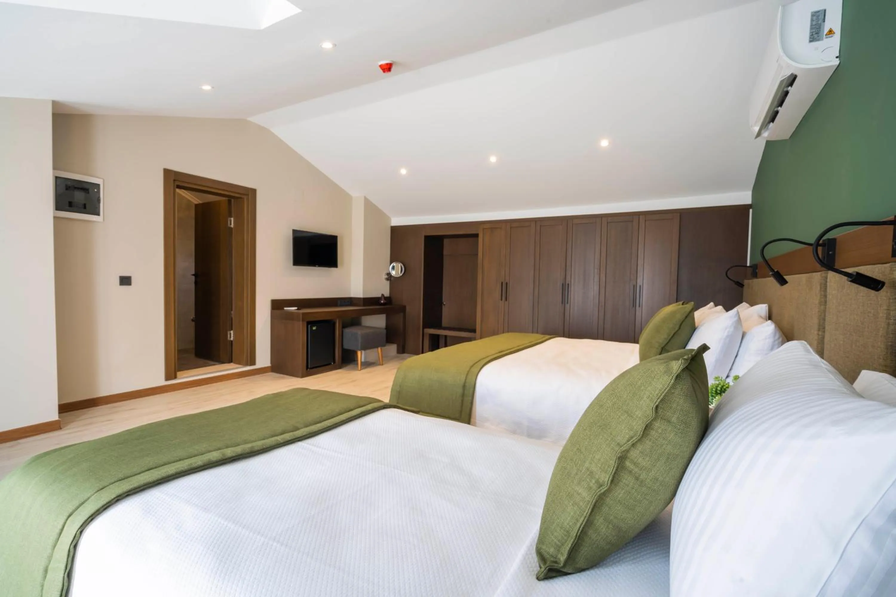 Bed in WEST HOUSE EXCLUSIVE HOTEL