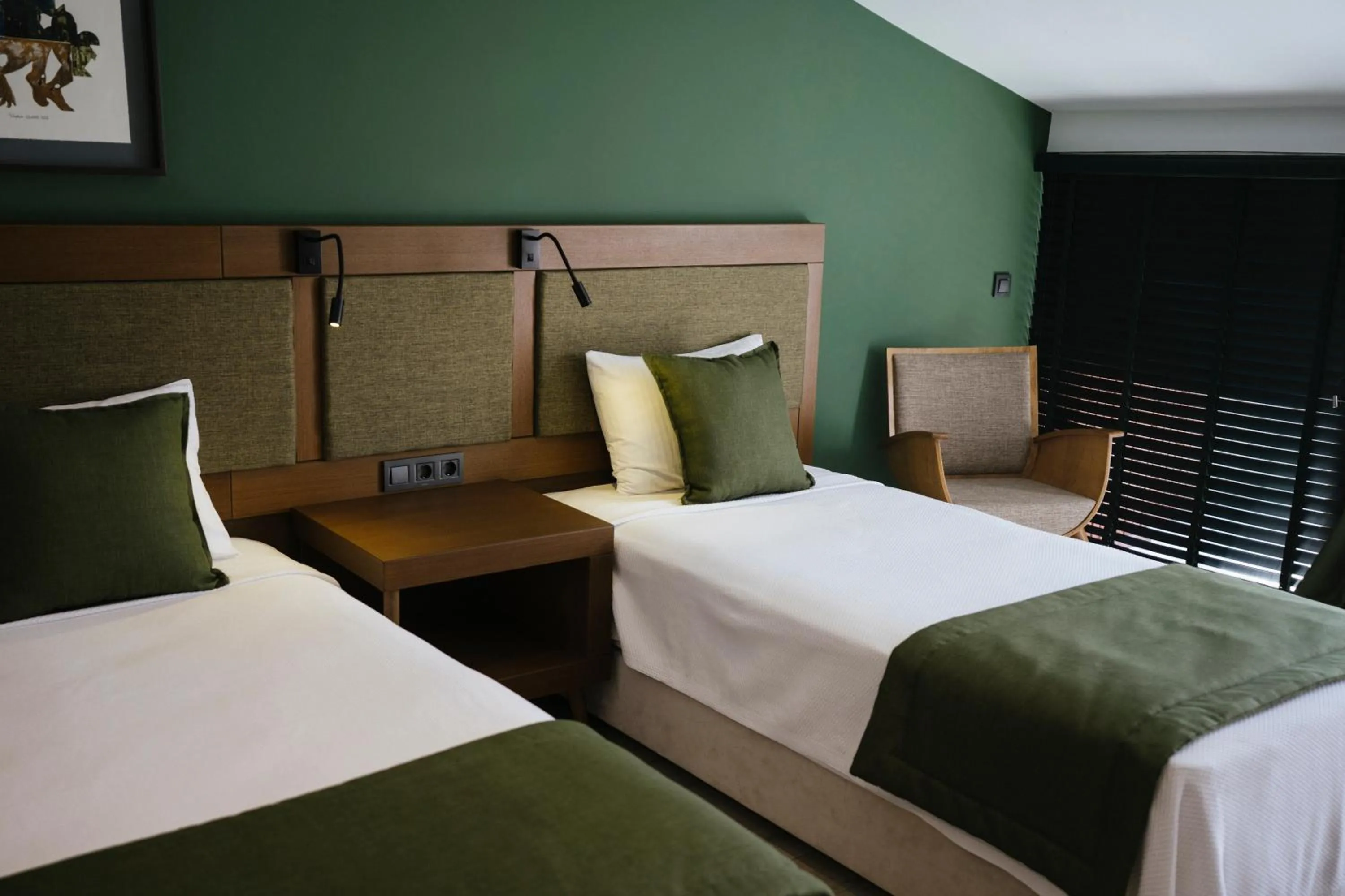 Bed in WEST HOUSE EXCLUSIVE HOTEL