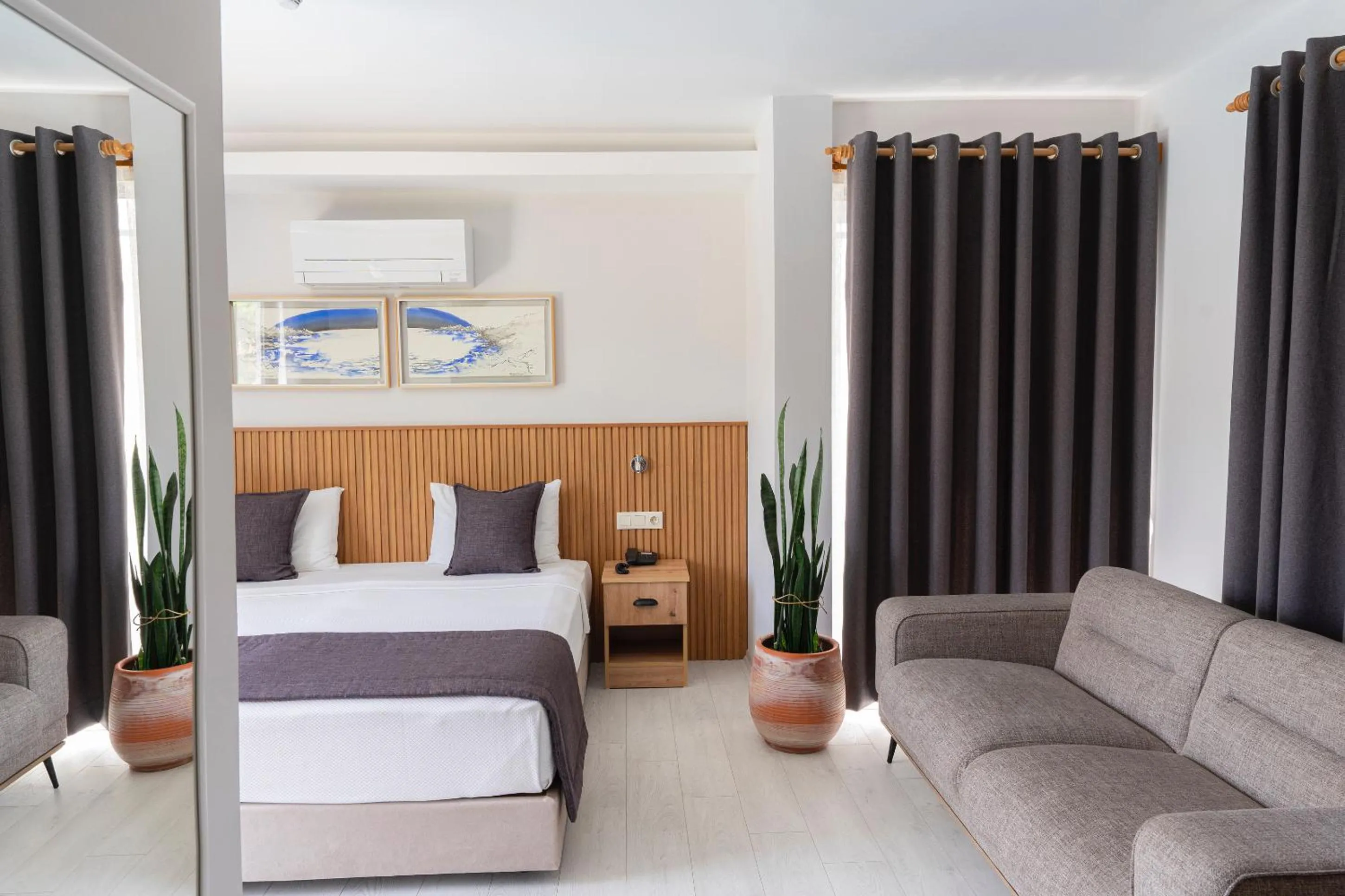 Bed in WEST HOUSE EXCLUSIVE HOTEL