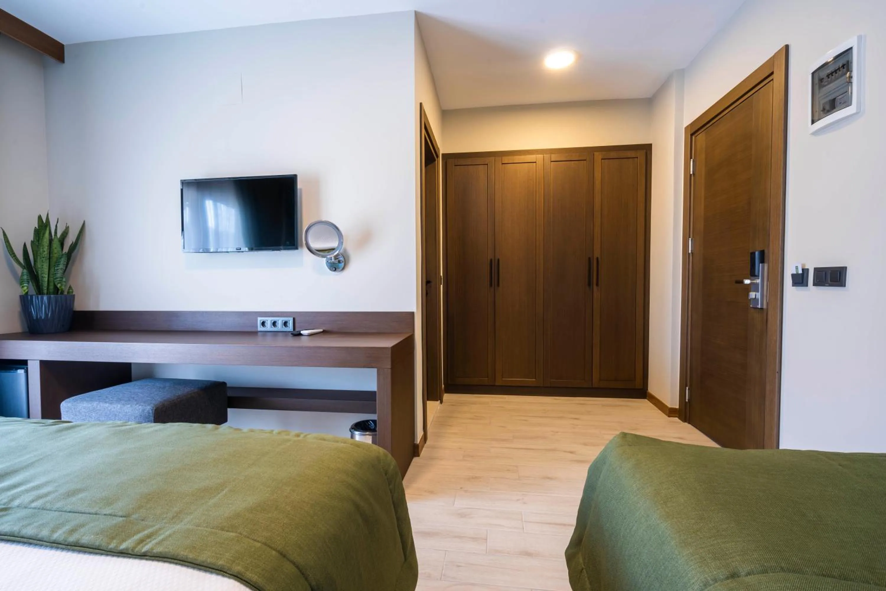 Bed in WEST HOUSE EXCLUSIVE HOTEL