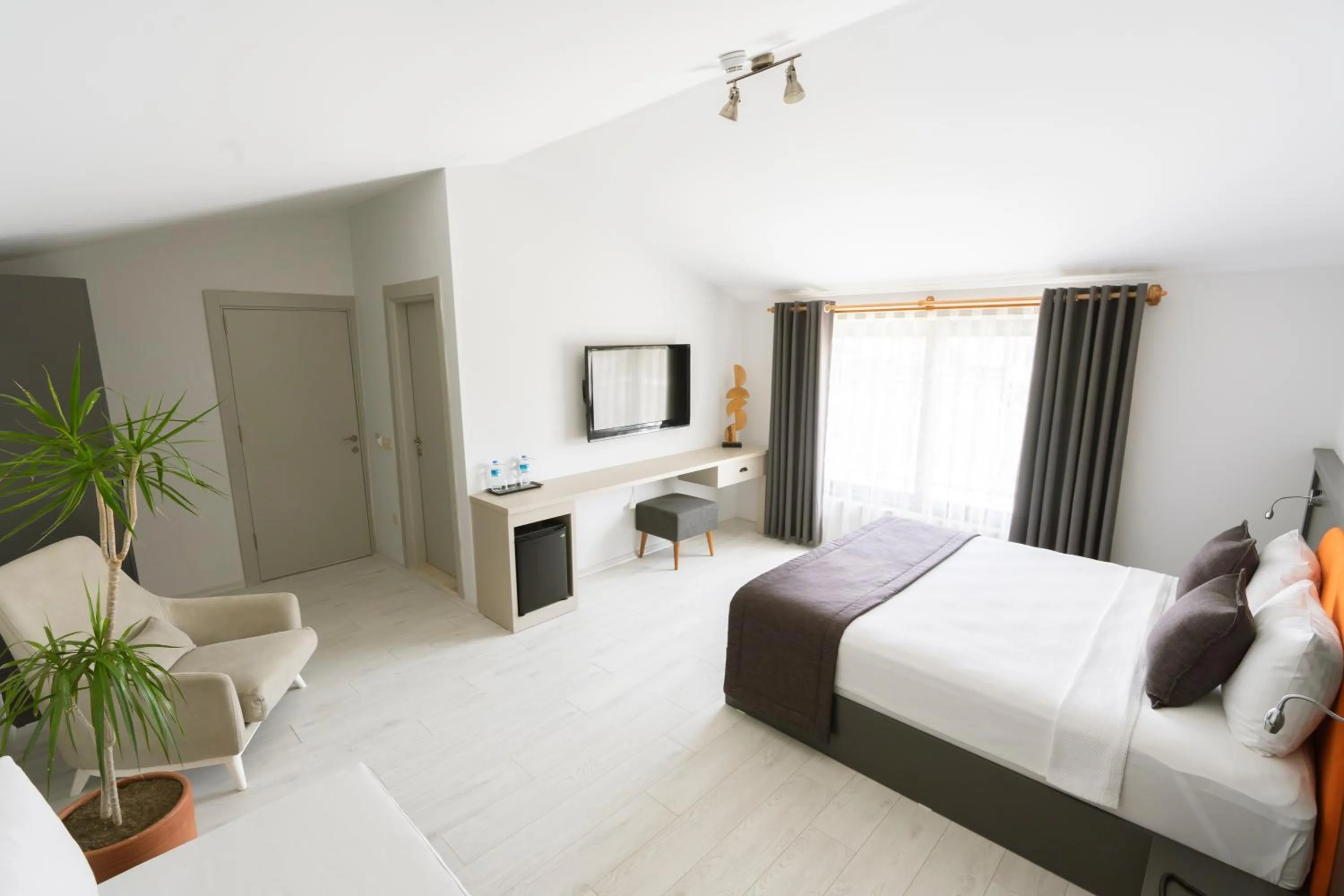 Bed in WEST HOUSE EXCLUSIVE HOTEL