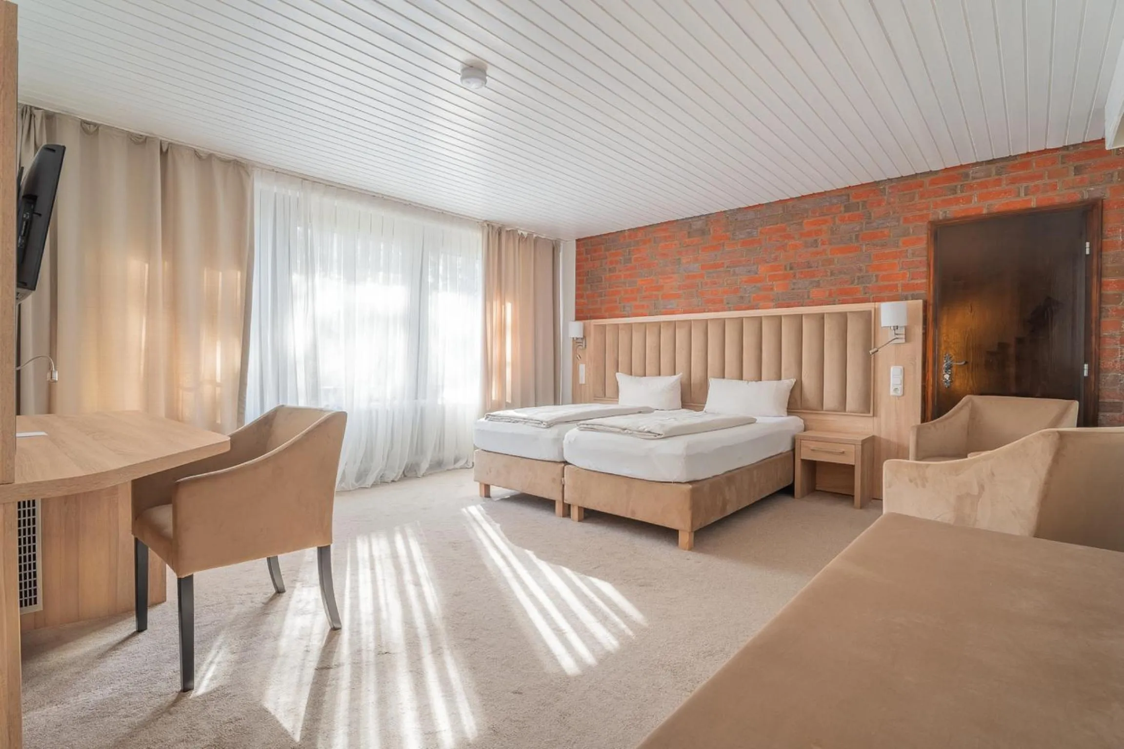 Photo of the whole room, Bed in Hotel Zur Heidschnucke