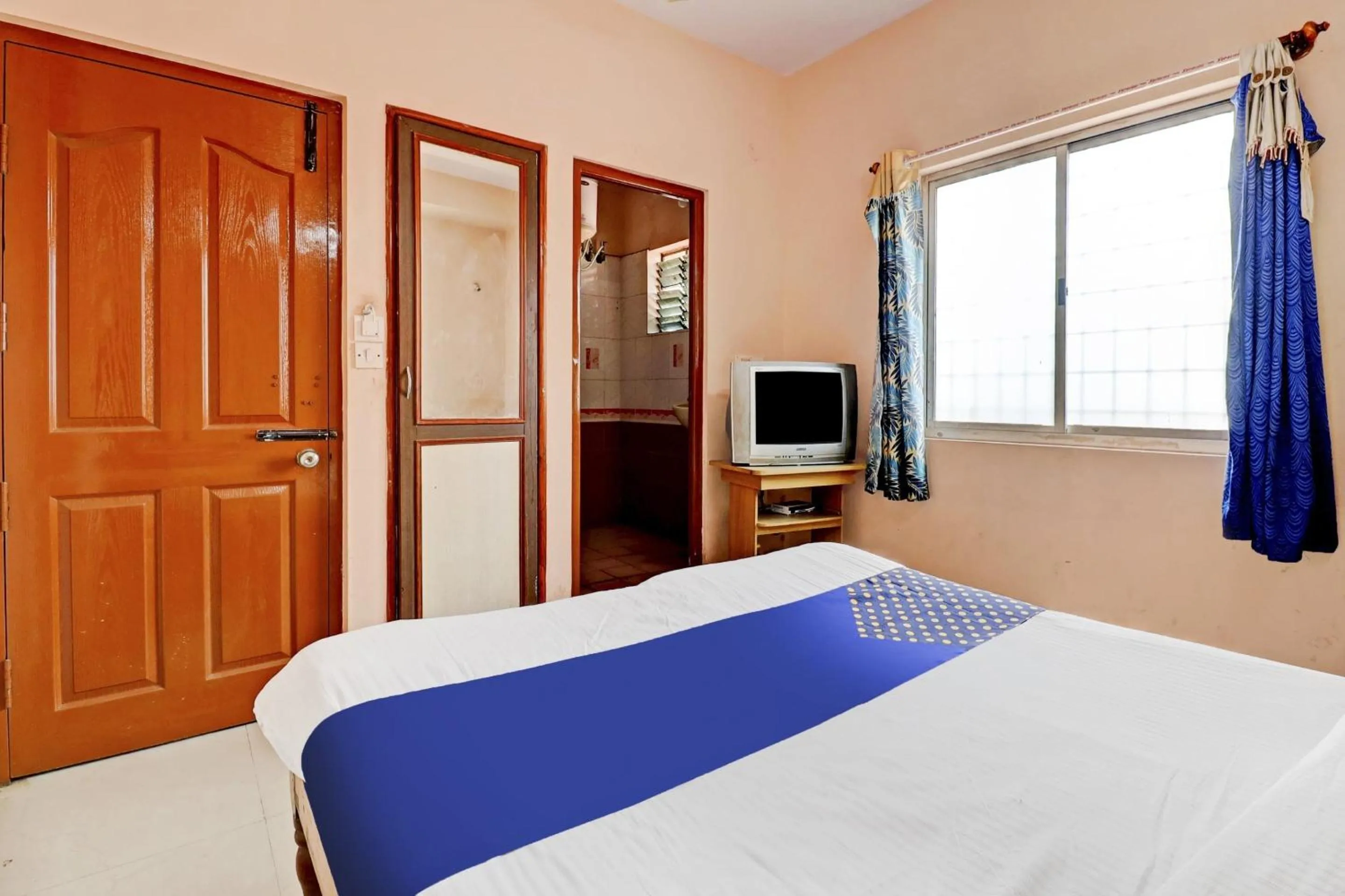 Bedroom, Bed in Hotel O Spot on S L V Comfort