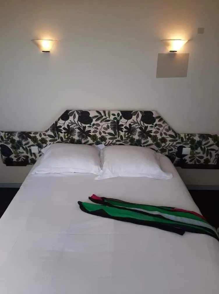 Bed in Fasthotel L'Eldorado