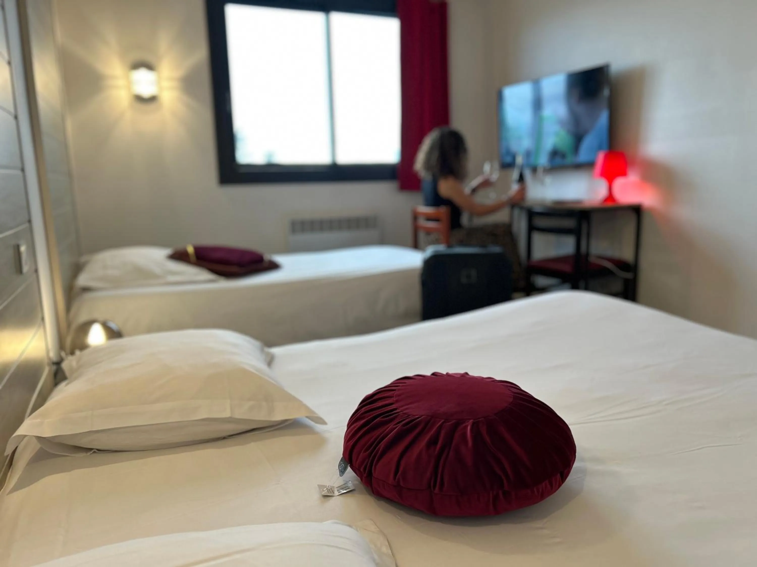 Bed in Fasthotel L'Eldorado