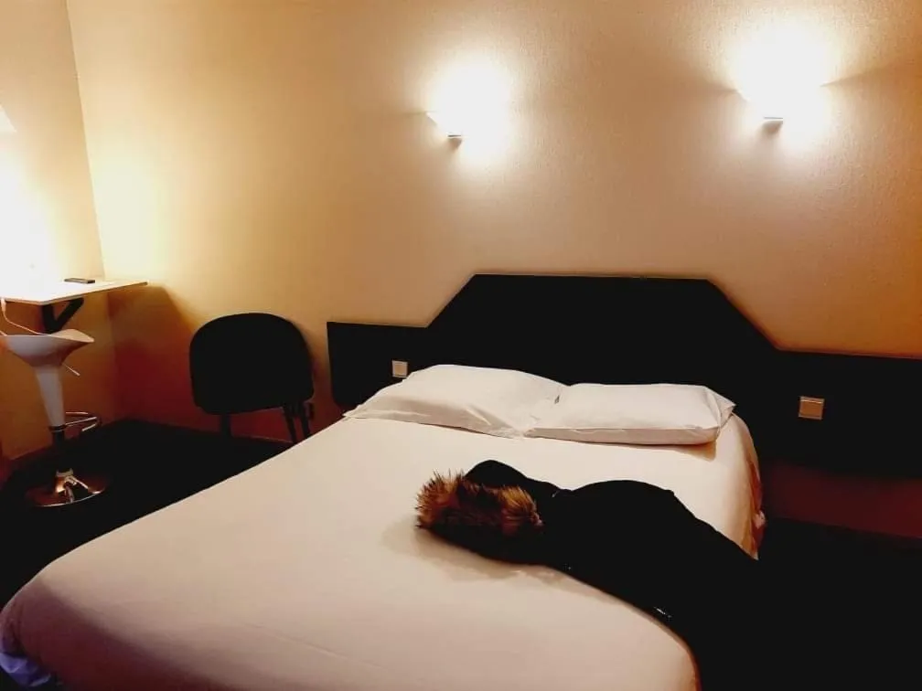 Bed in Fasthotel L'Eldorado