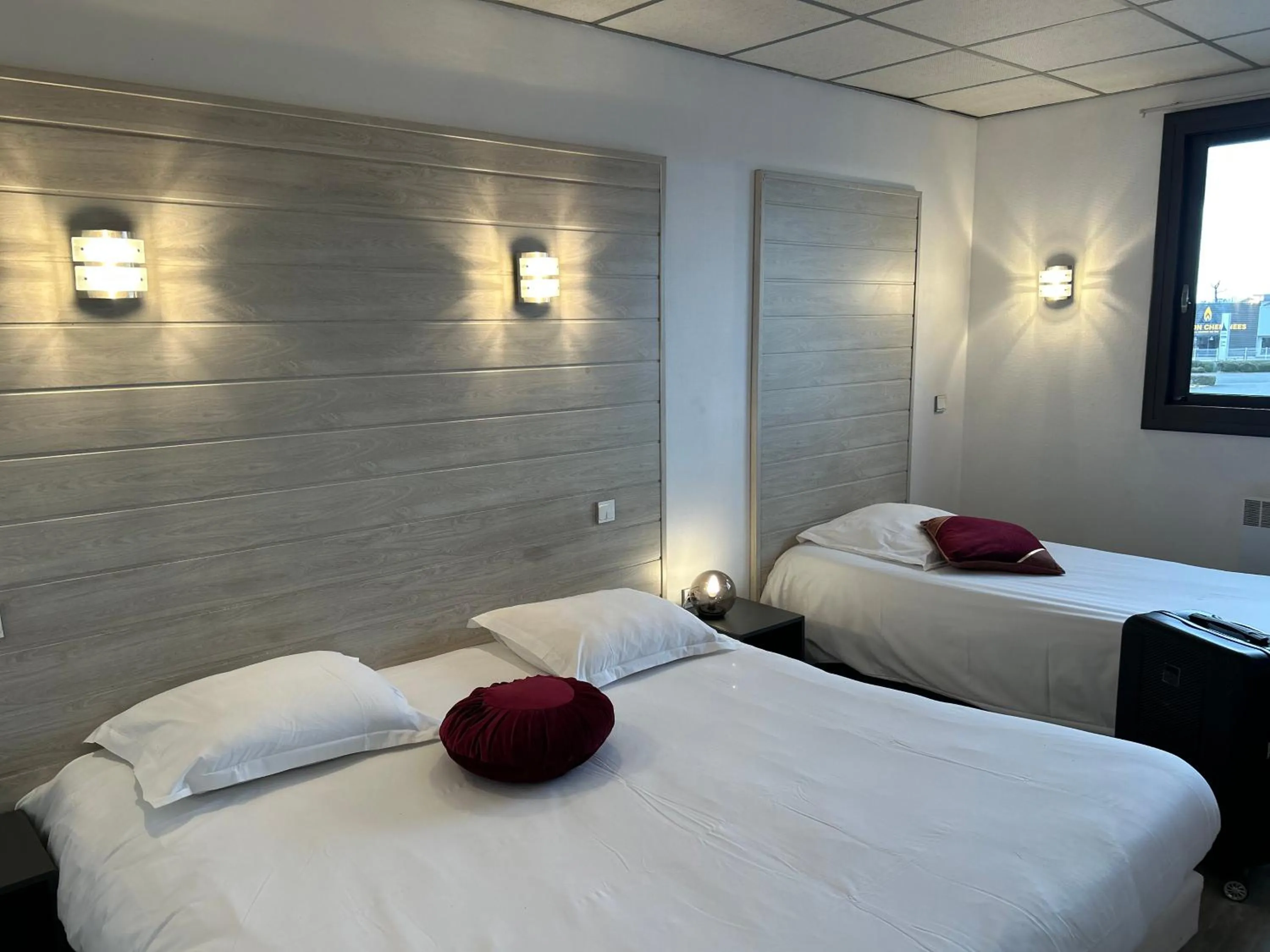 Bed in Fasthotel L'Eldorado