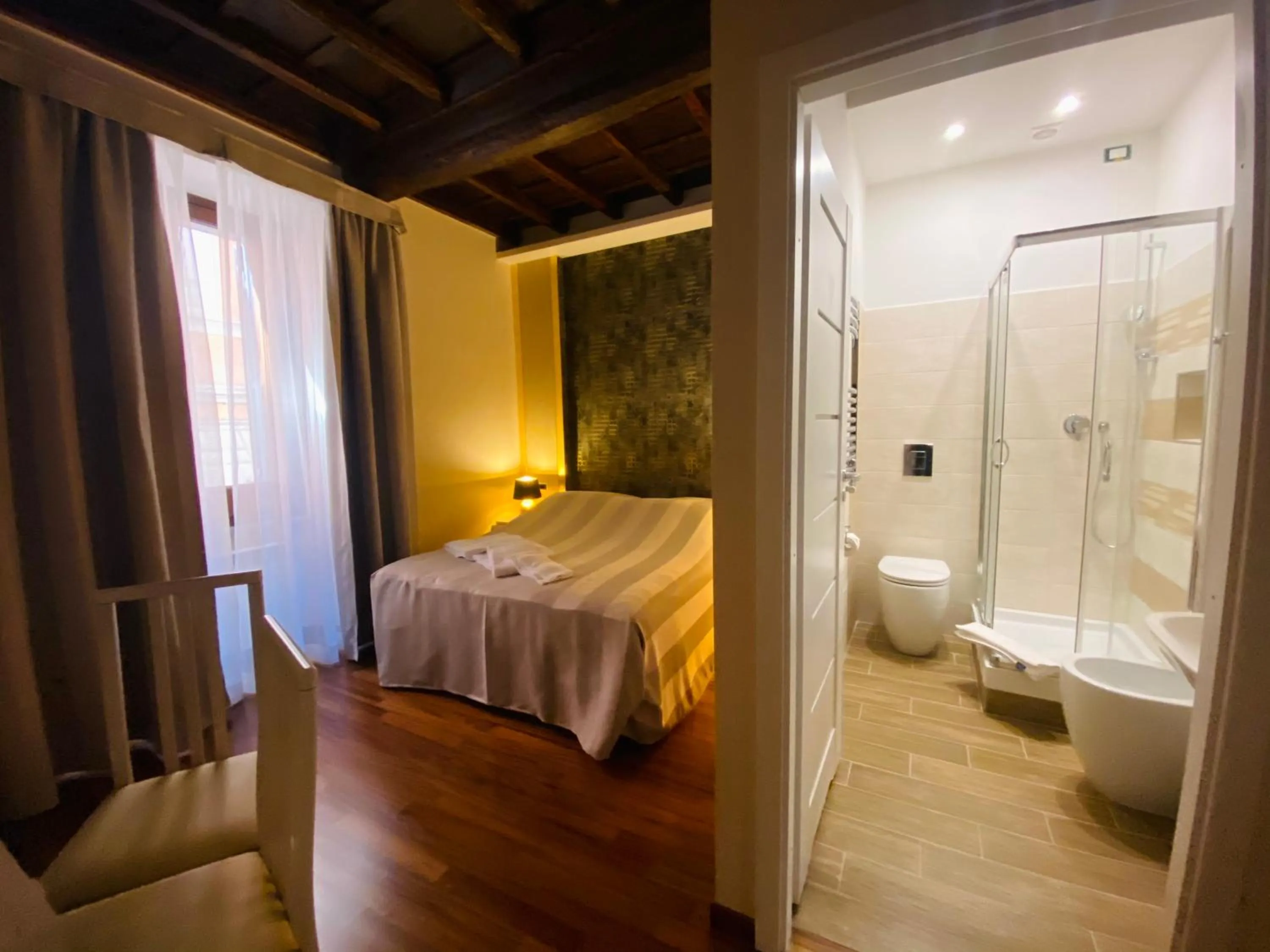 Photo of the whole room, Bed in Campo Marzio Hotelier