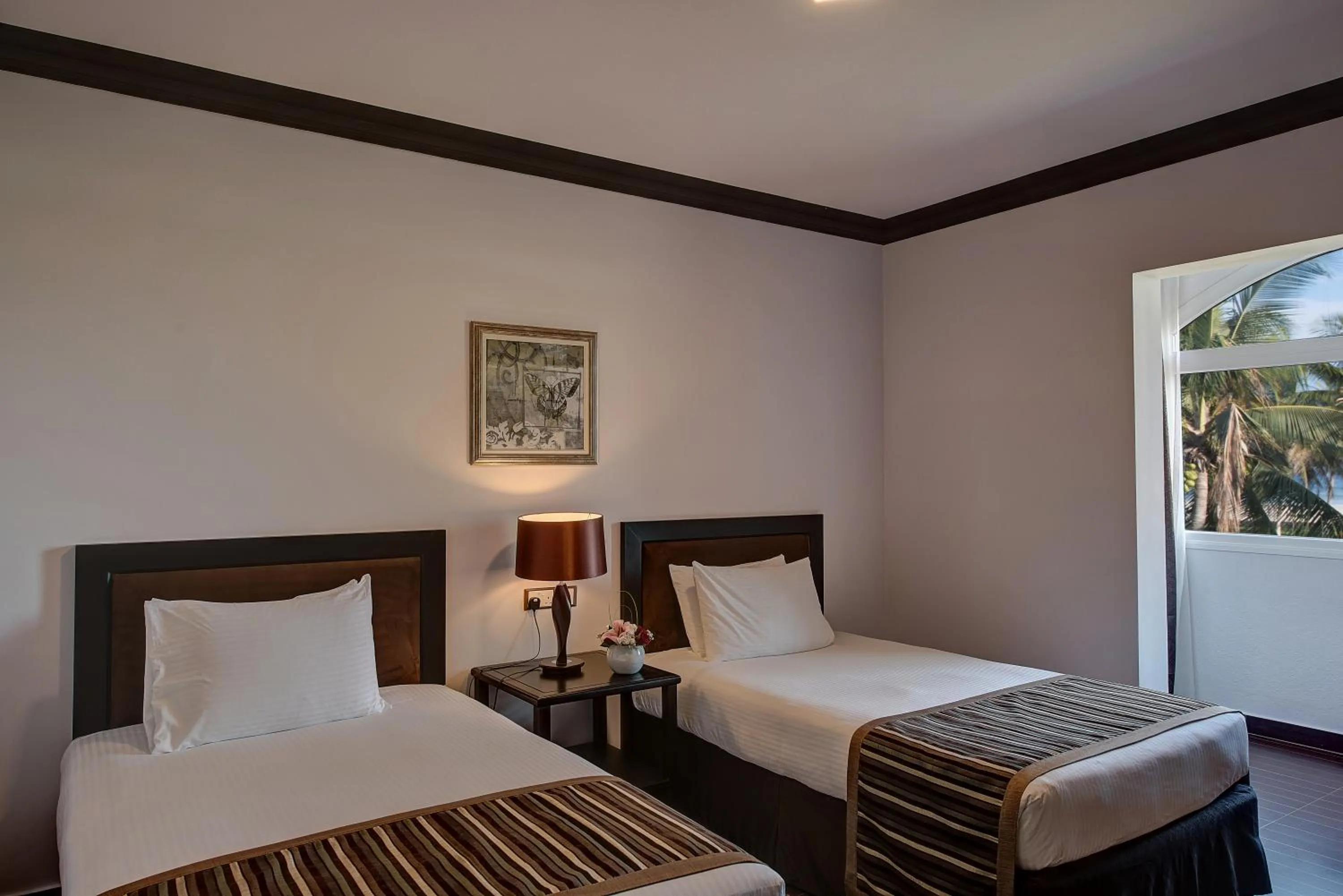 Bedroom, Bed in Crowne Plaza Resort Salalah by IHG