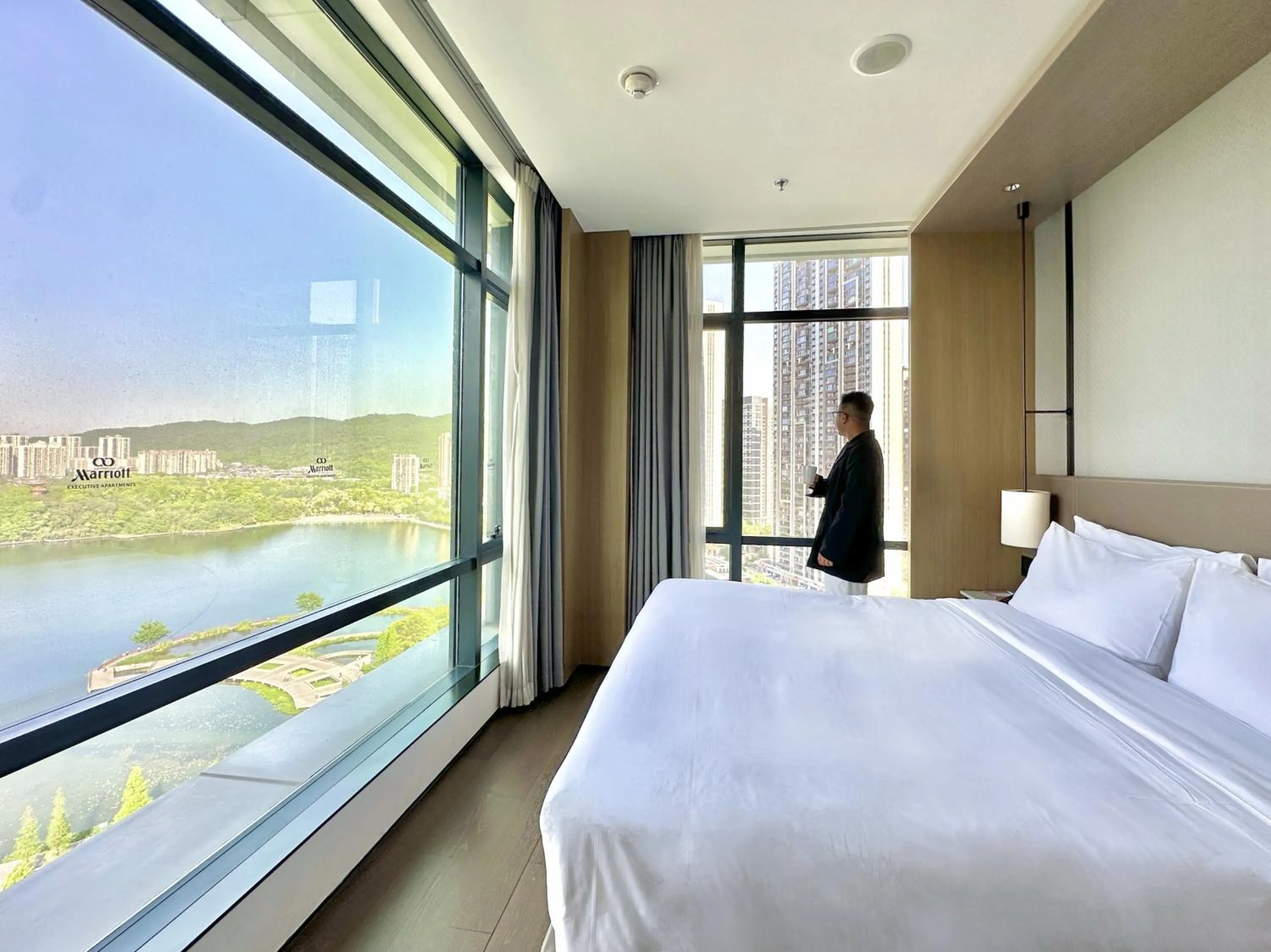 Photo of the whole room, Bed in The Meixi Lake, Changsha Marriott Executive Apartments