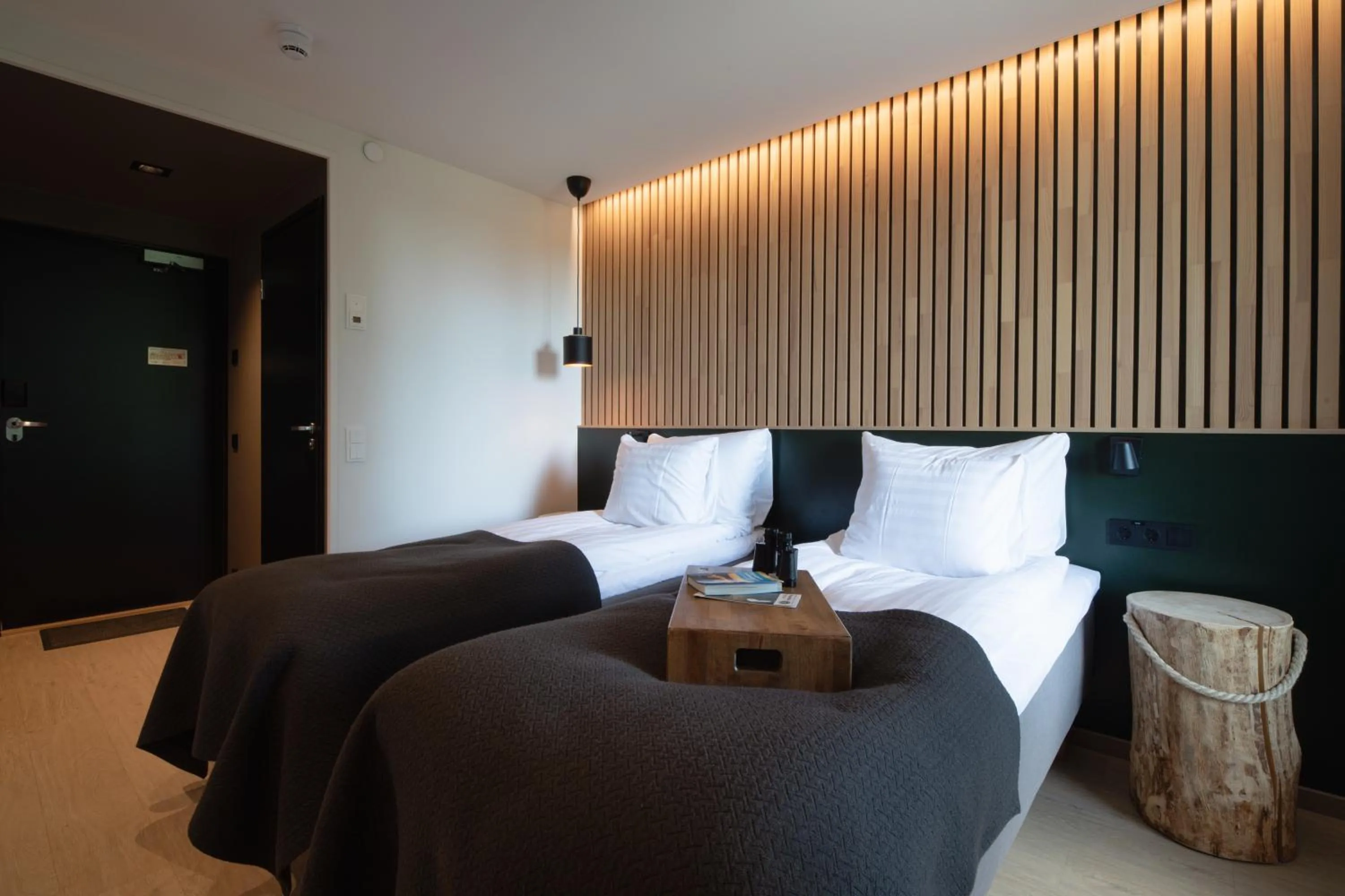 Bed in Haltia Lake Lodge nature boutique hotel & glamping