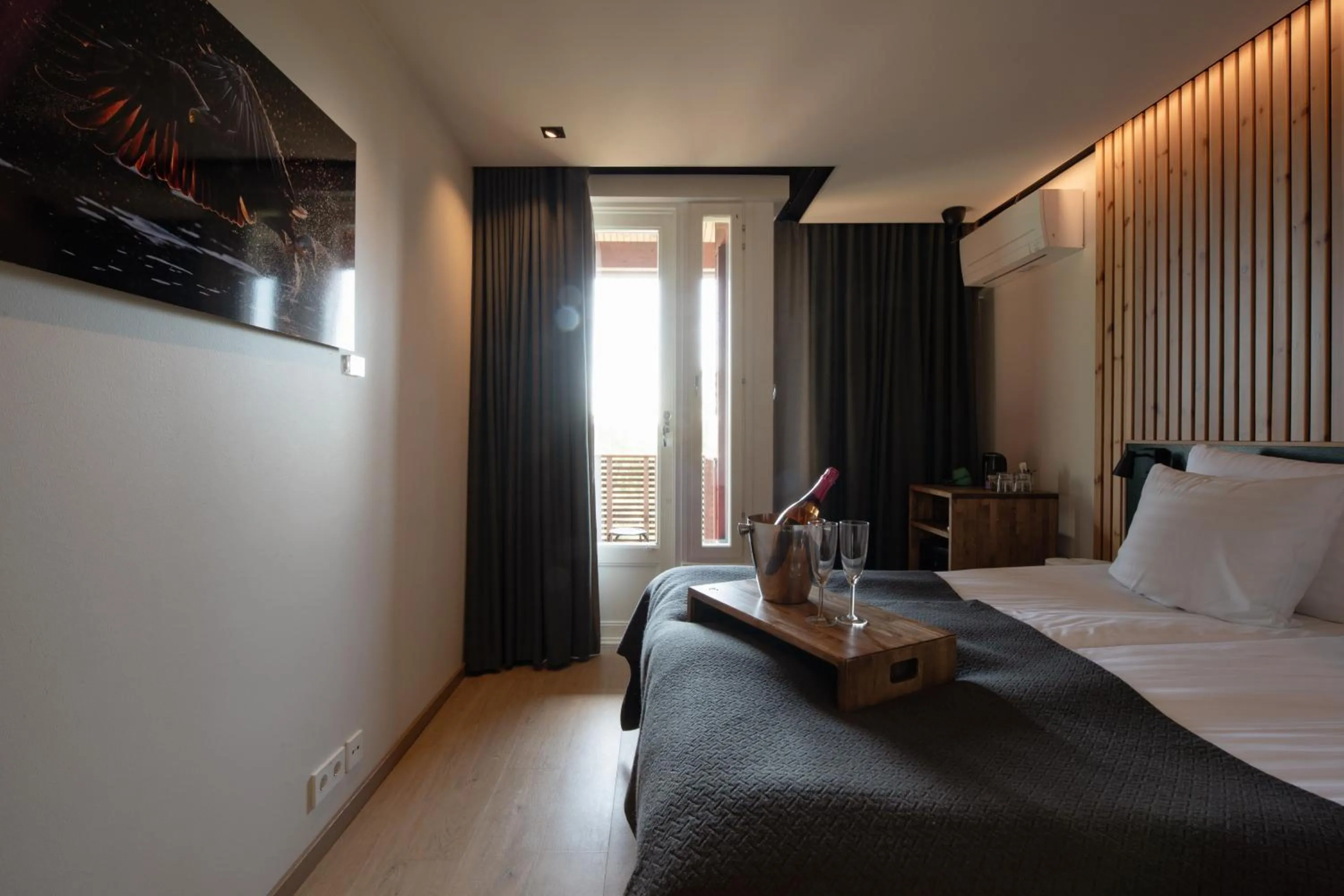 Bed in Haltia Lake Lodge nature boutique hotel & glamping