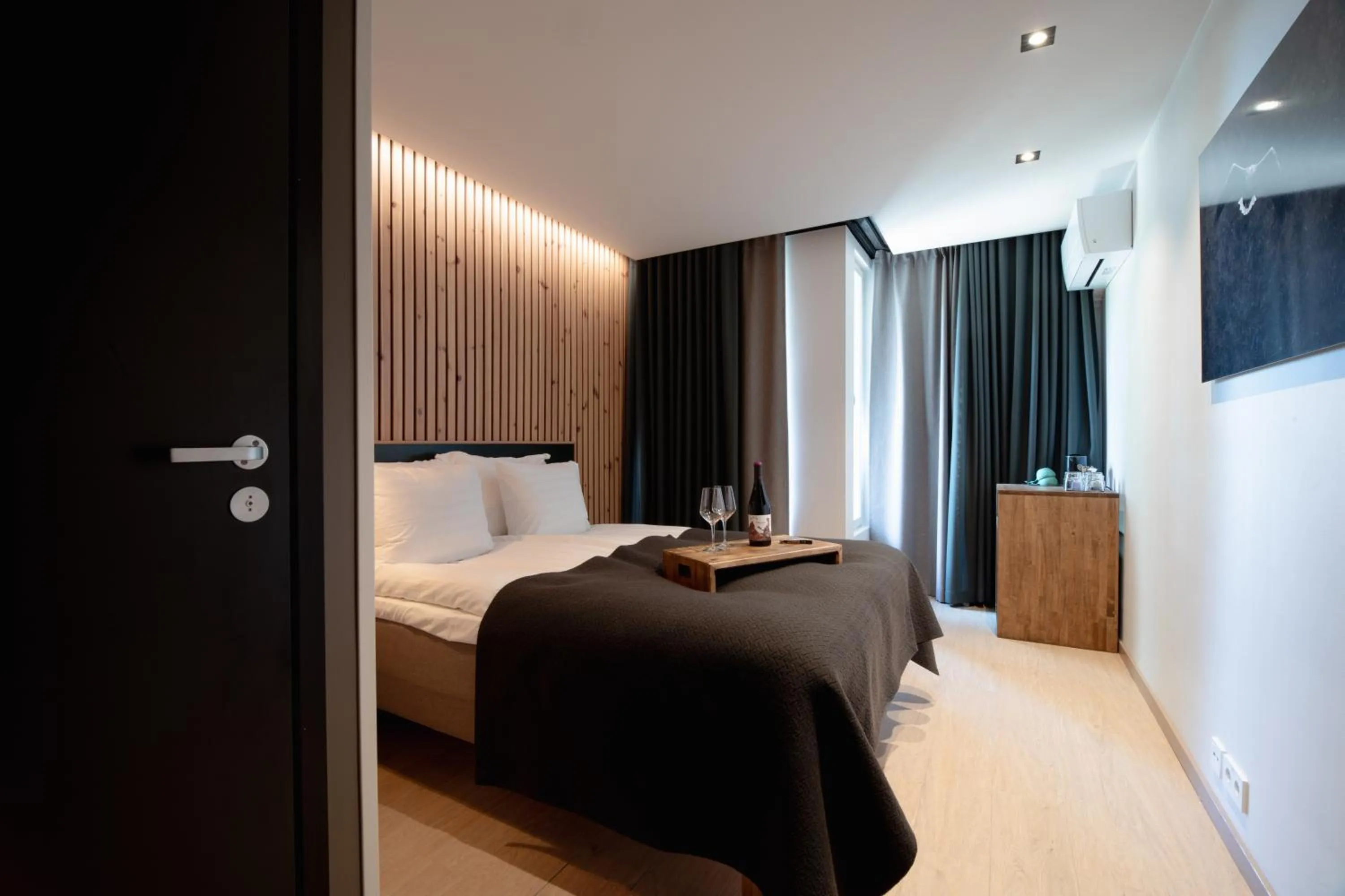 Bed in Haltia Lake Lodge nature boutique hotel & glamping