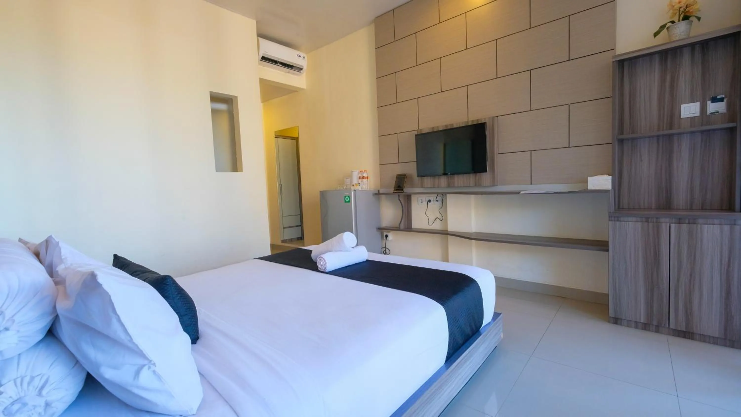 Bed in Graha Socio Hotel Nusa Dua Bali
