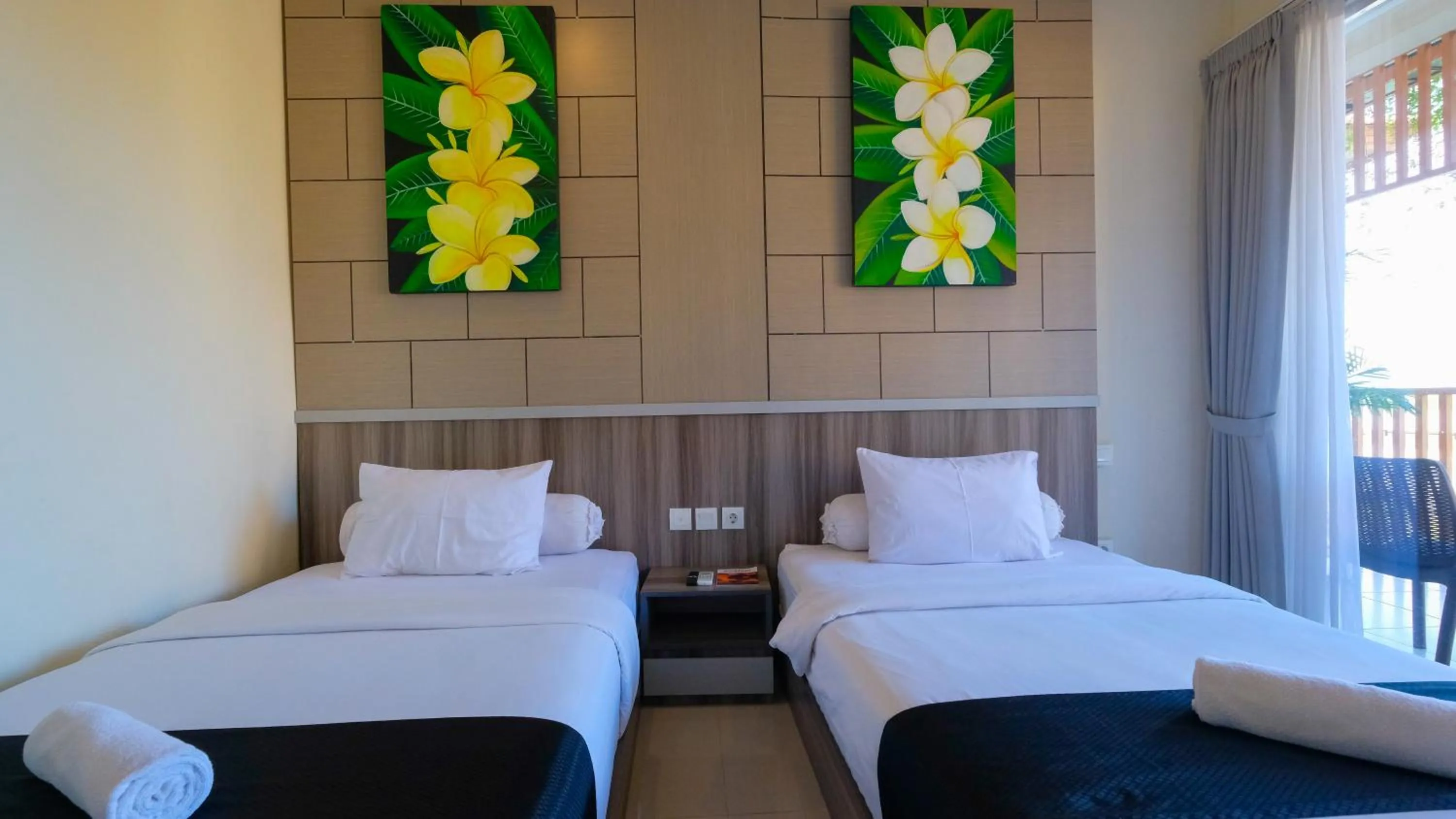 Bed in Graha Socio Hotel Nusa Dua Bali