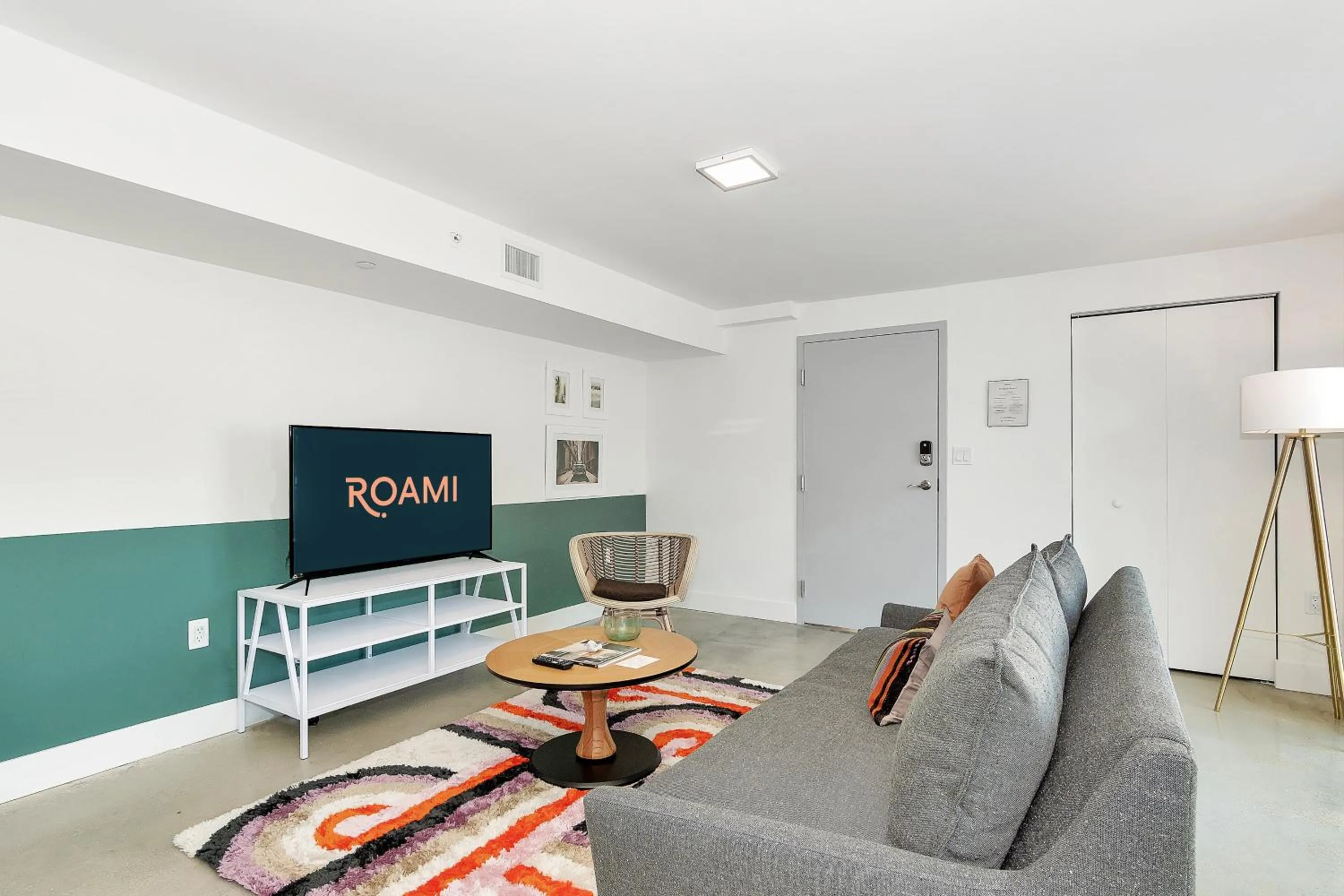 Living room, Bed in Roami at Grove 27