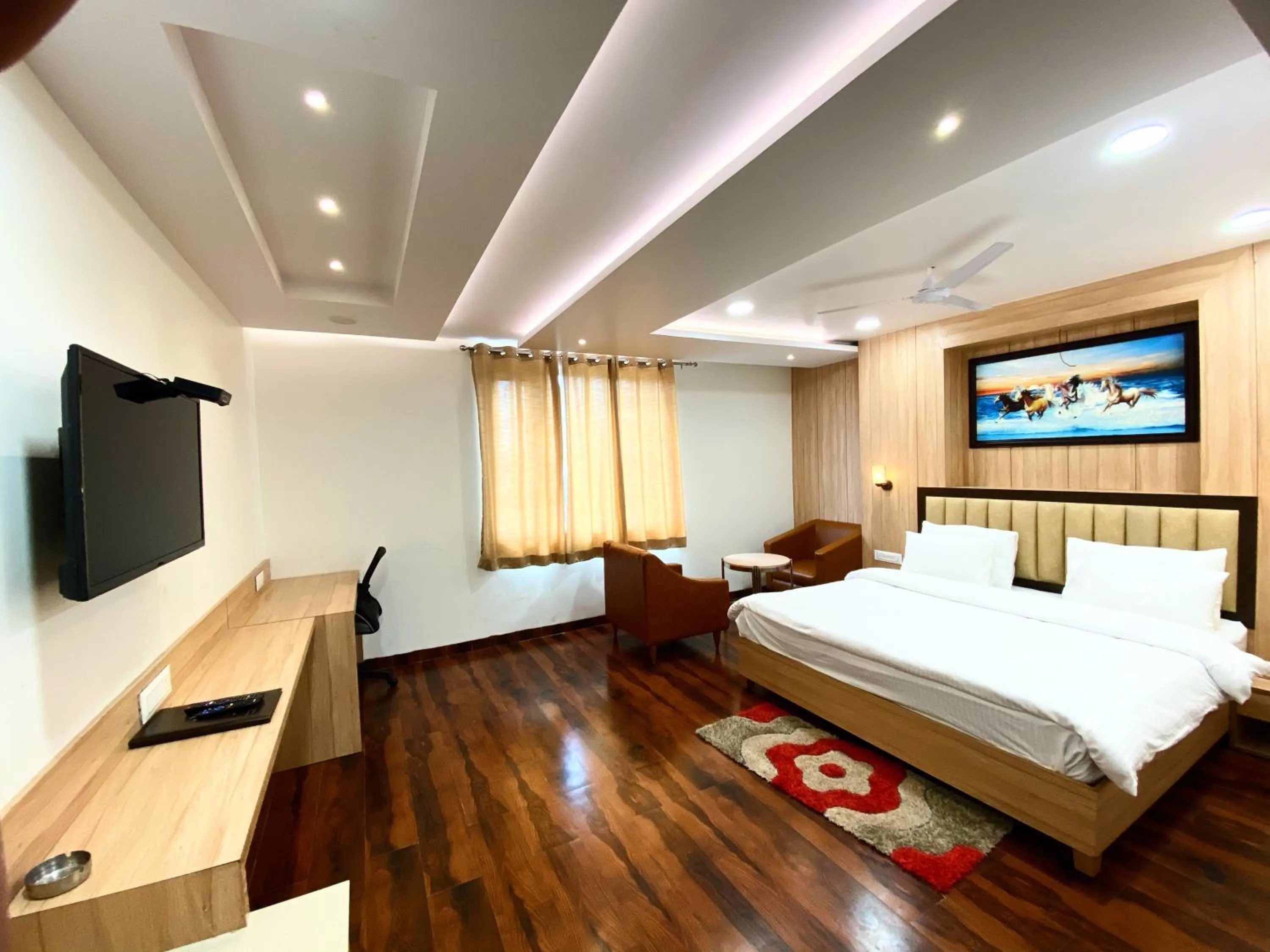 Photo of the whole room, Bed in Hotel Pradeep Star Inn