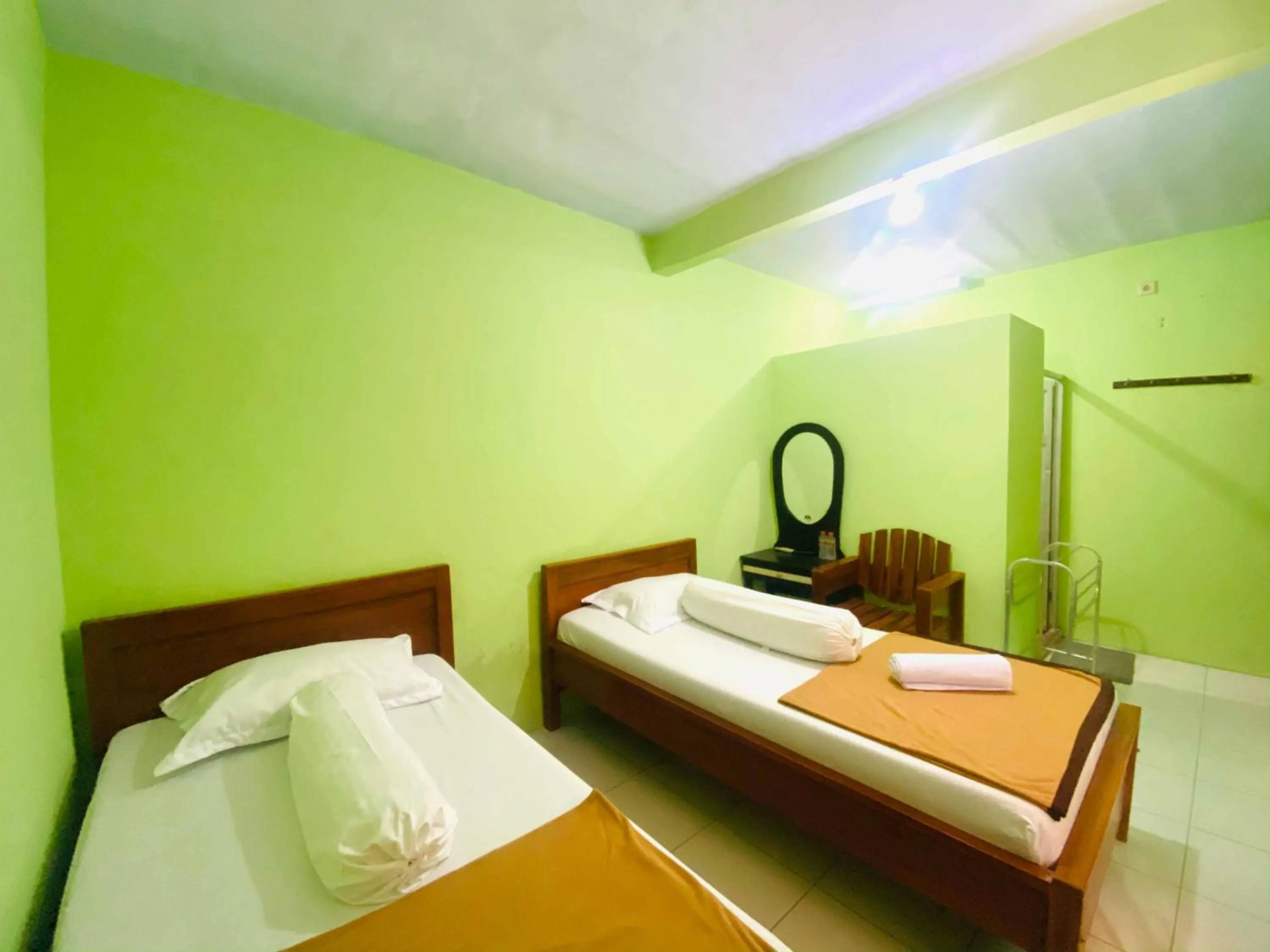 Photo of the whole room, Bed in Hotel Gerung 1 near Alun Alun Nganjuk Mitra RedDoorz