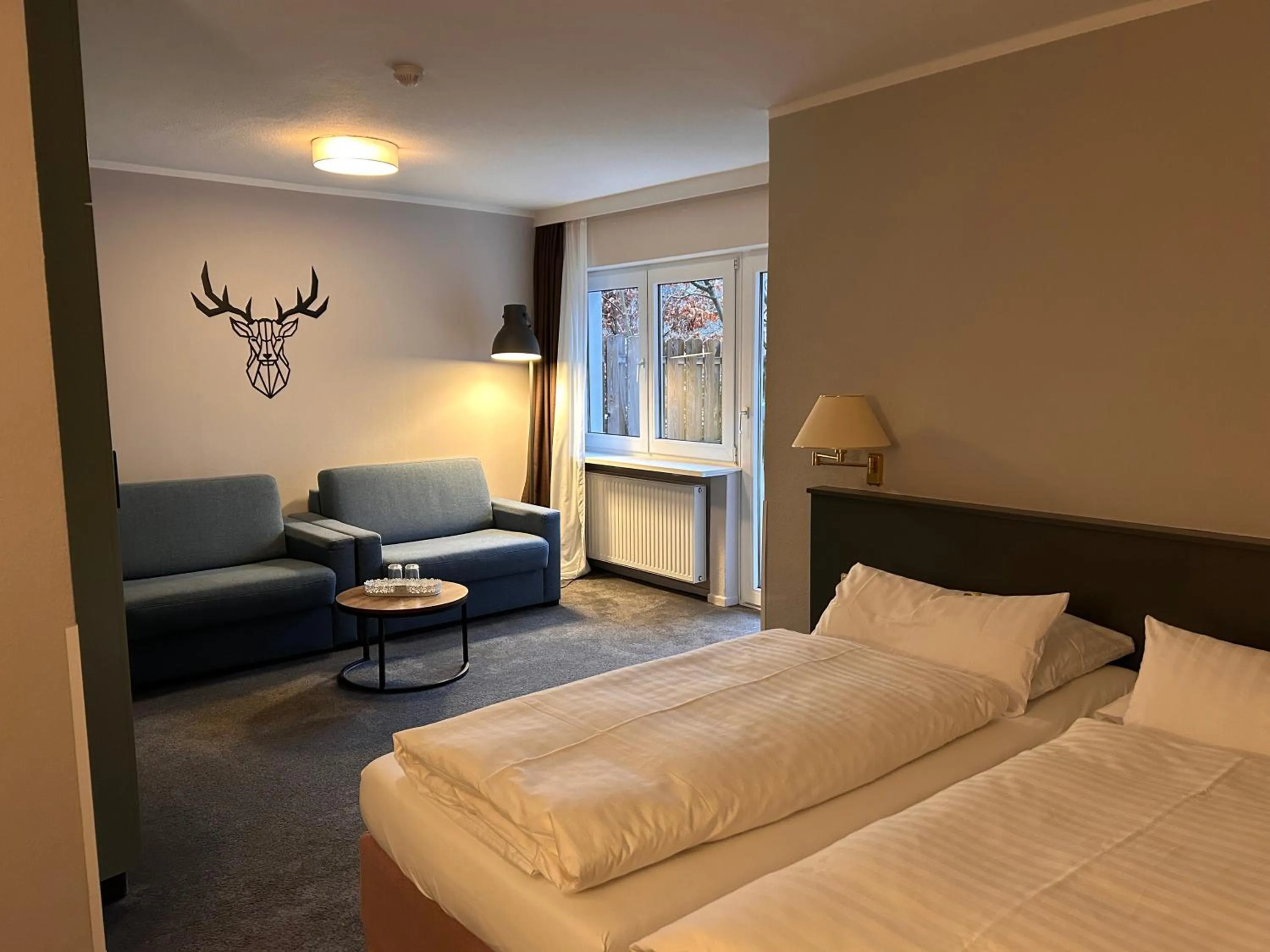 Living room, Bed in Hotel Haus am Hochwald