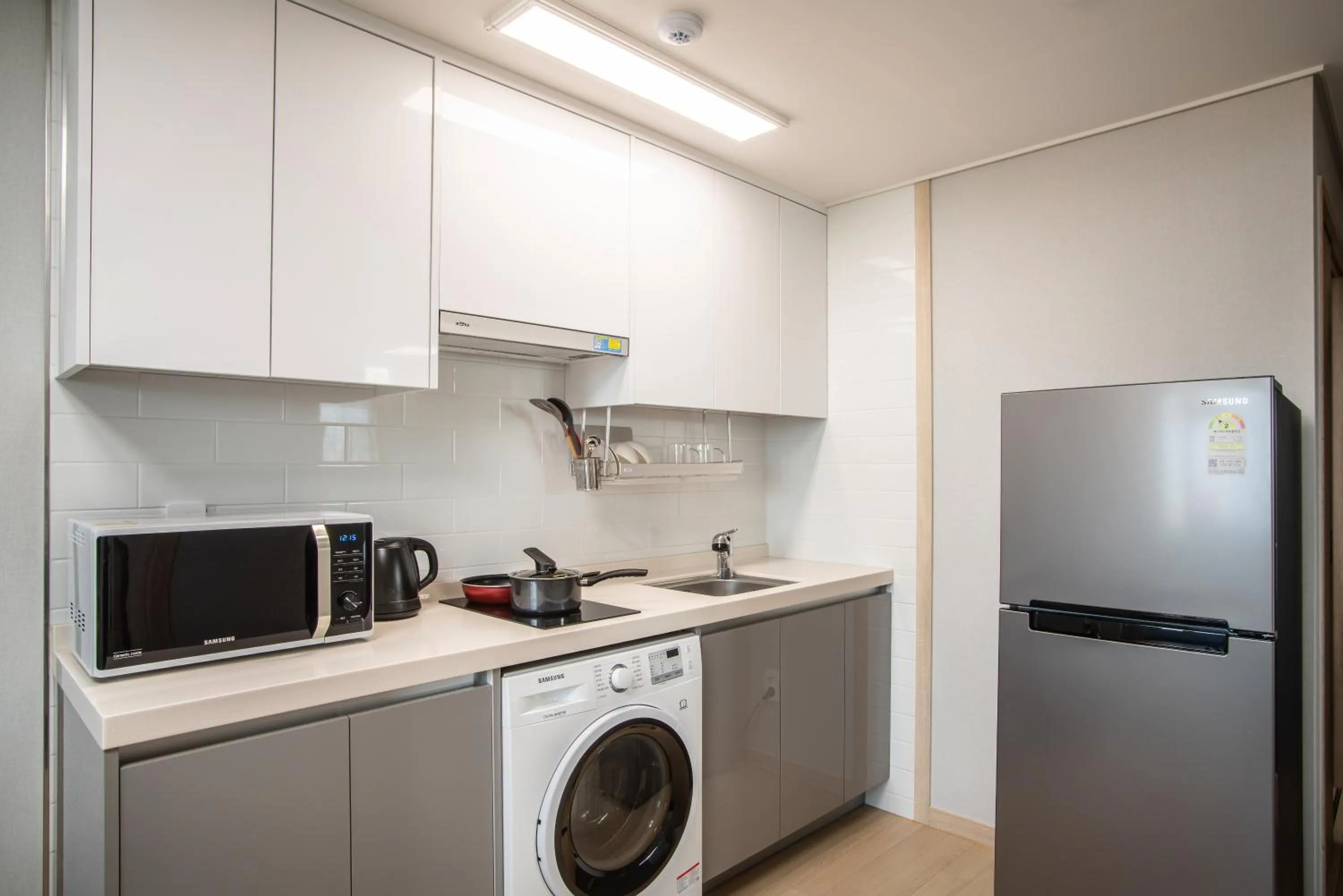 Kitchen or kitchenette in Jeju Central Park Residence