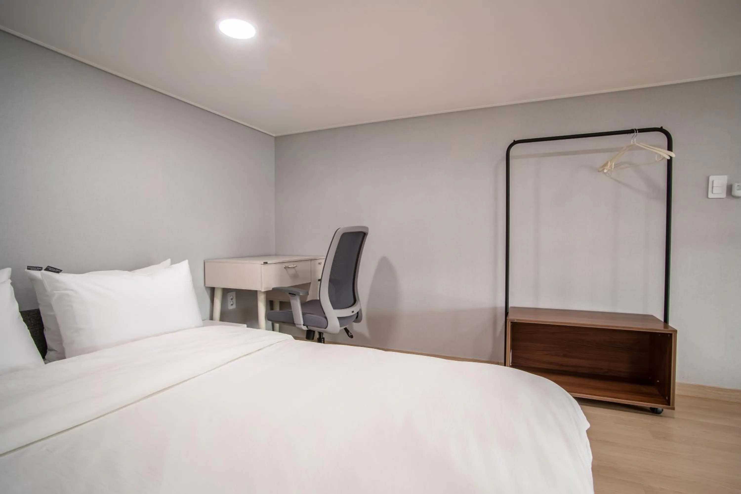 Bed in Jeju Central Park Residence