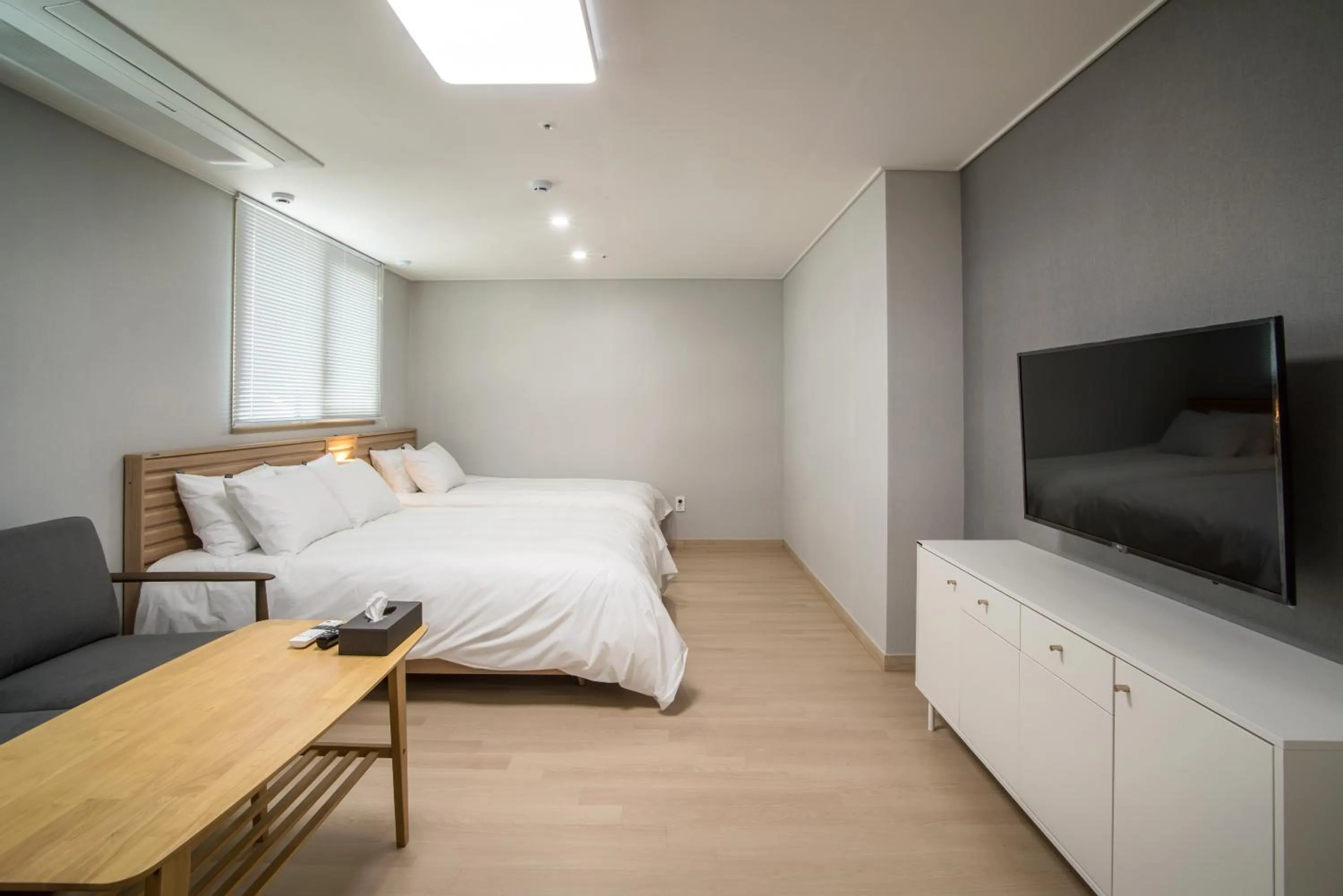 Bed in Jeju Central Park Residence