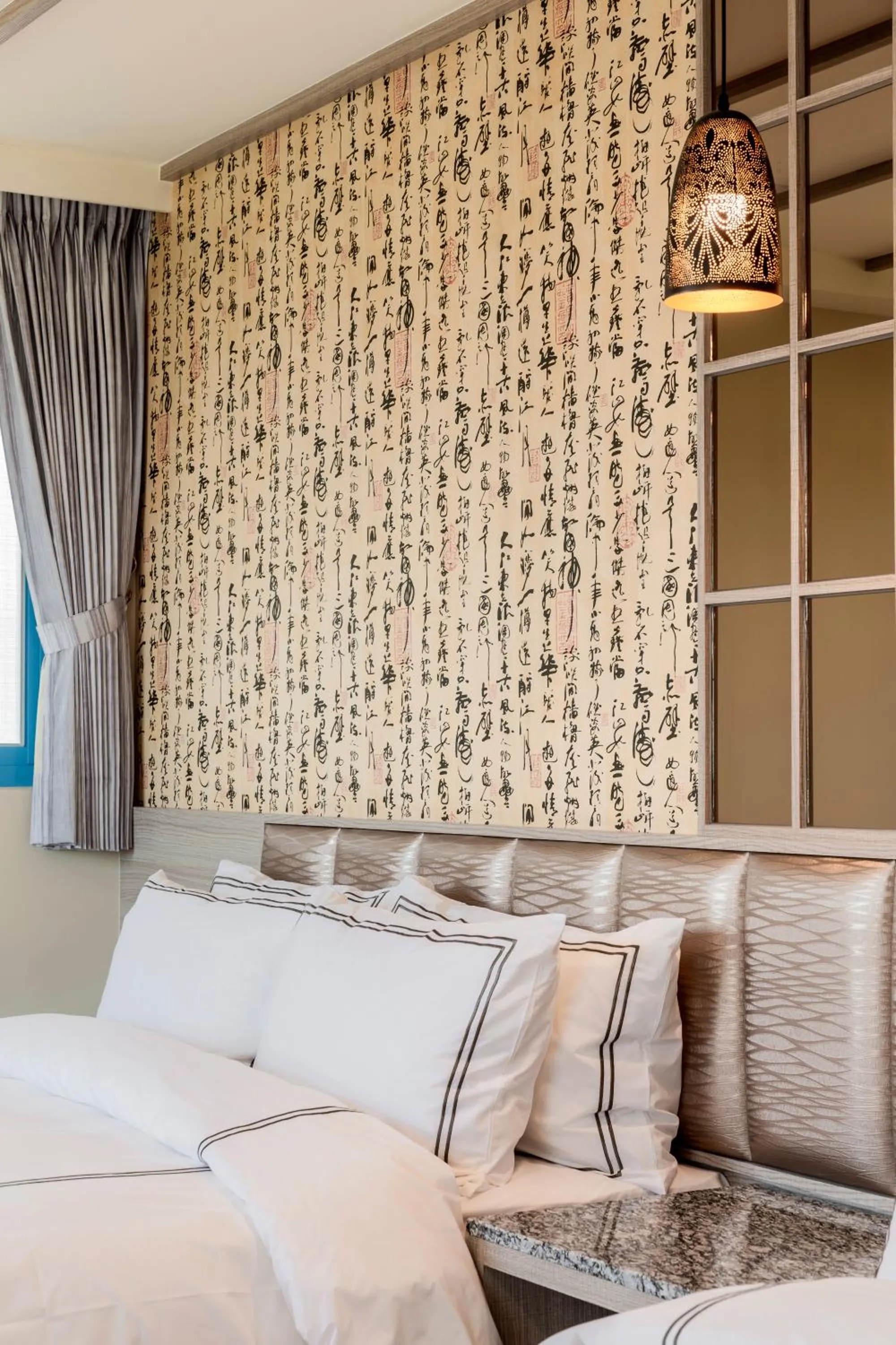 Bed in San Chiao Hotel