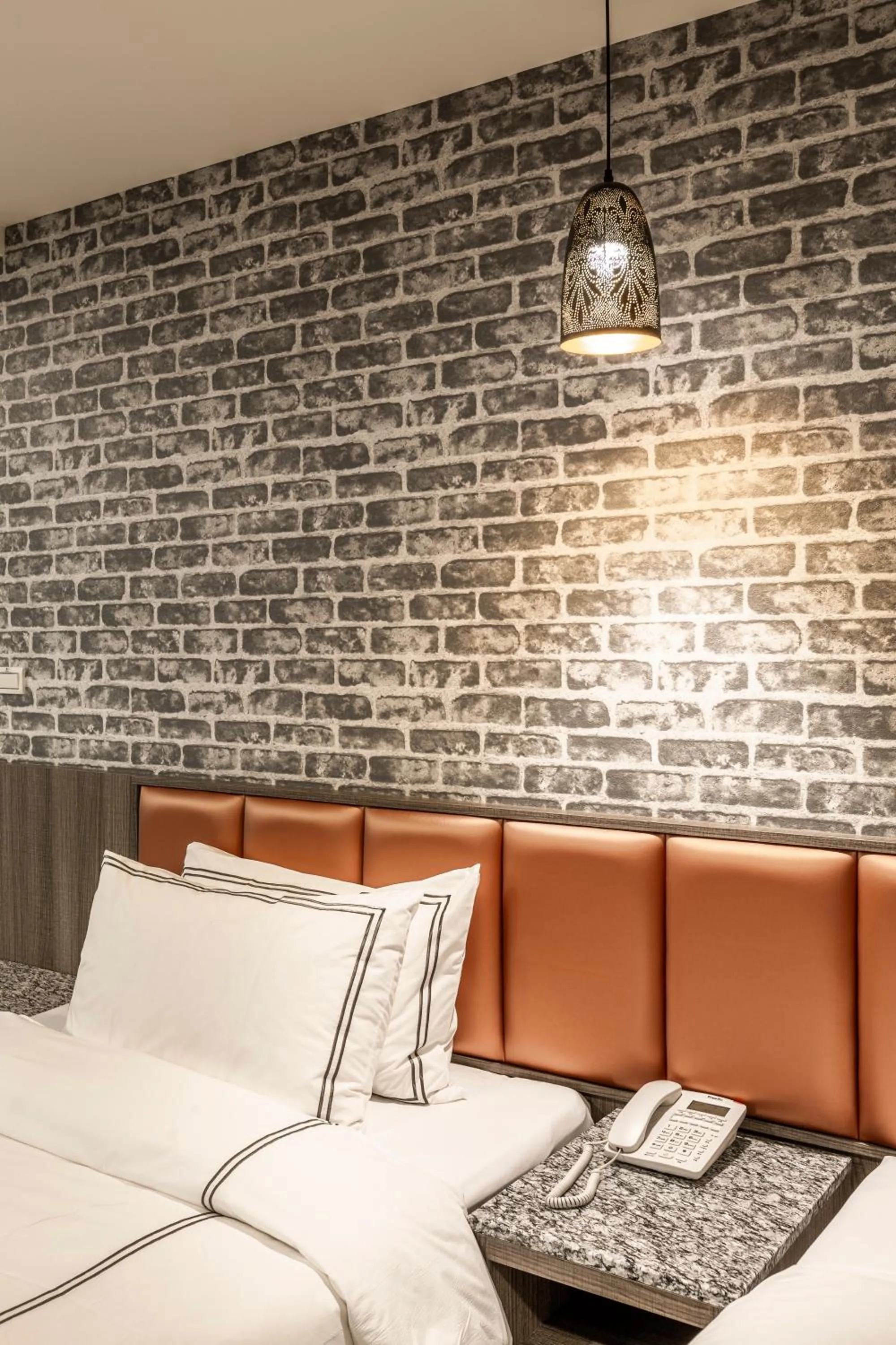 Bed in San Chiao Hotel