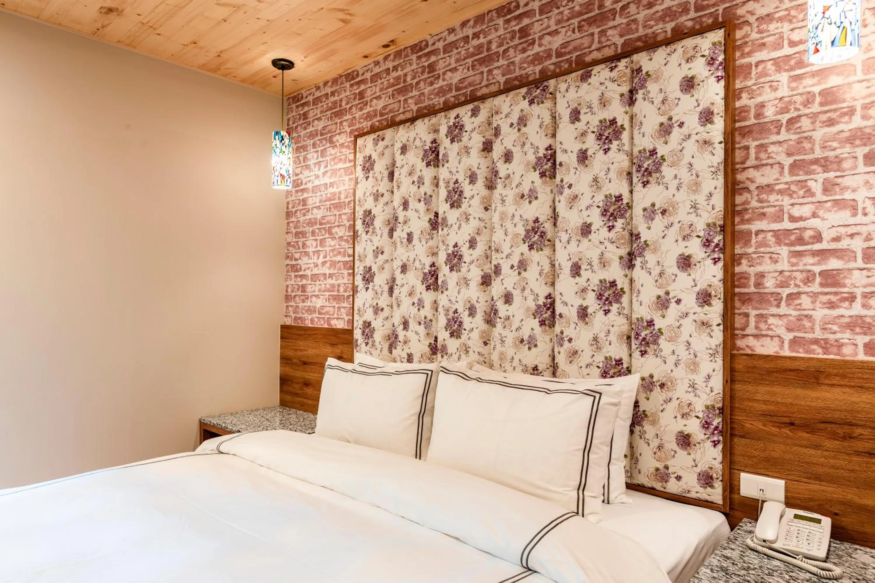 Bed in San Chiao Hotel