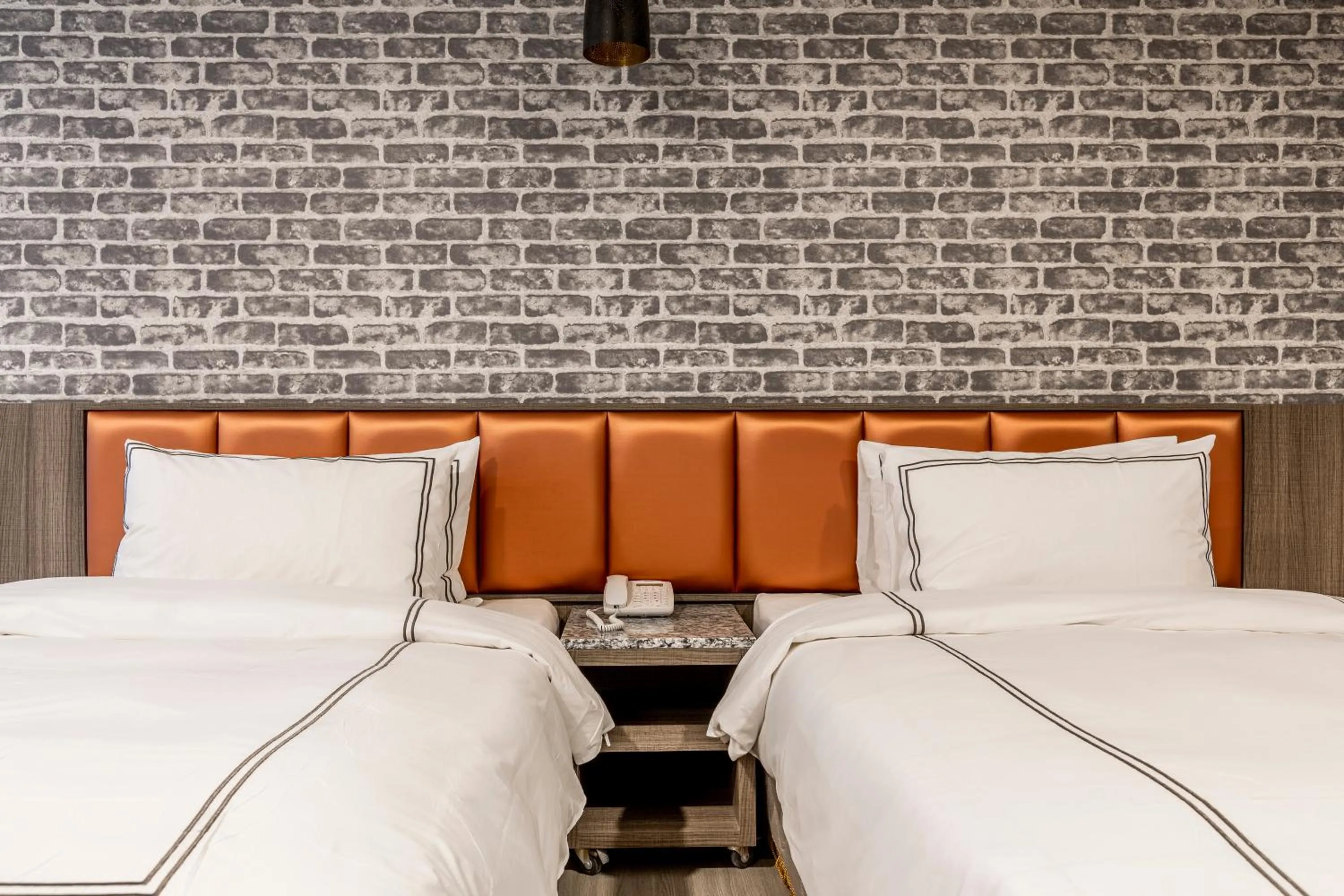 Bed in San Chiao Hotel