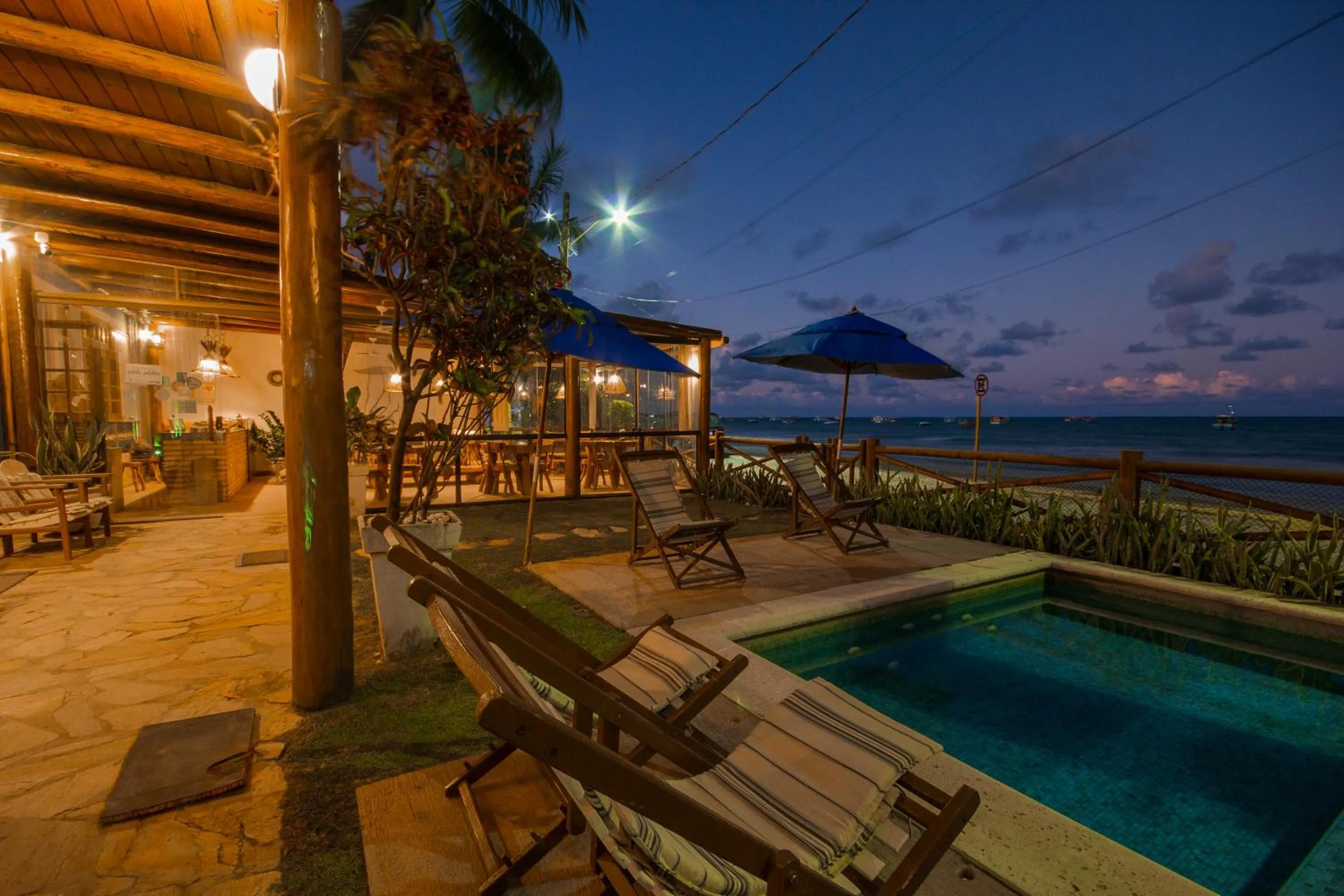 Swimming pool in Pousada Ecohar Yoga