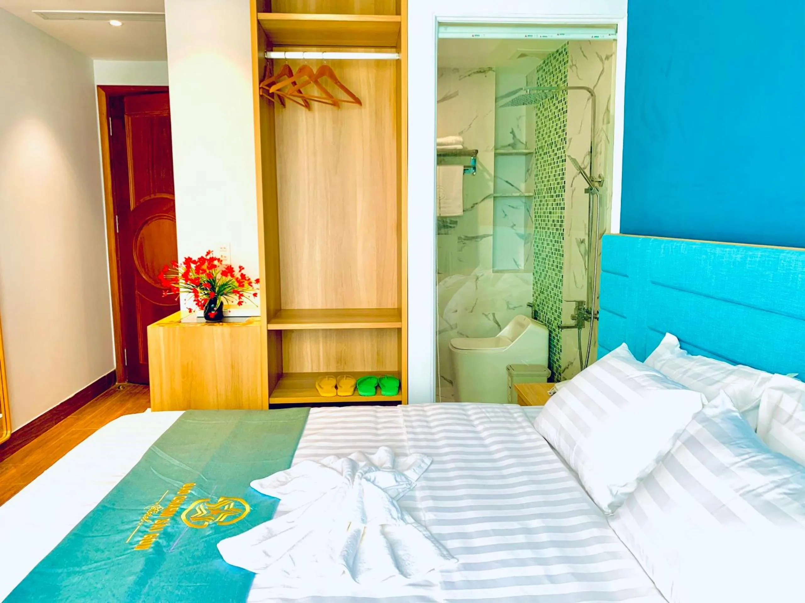 Bed in Sao Charm Sài Gòn Hotel